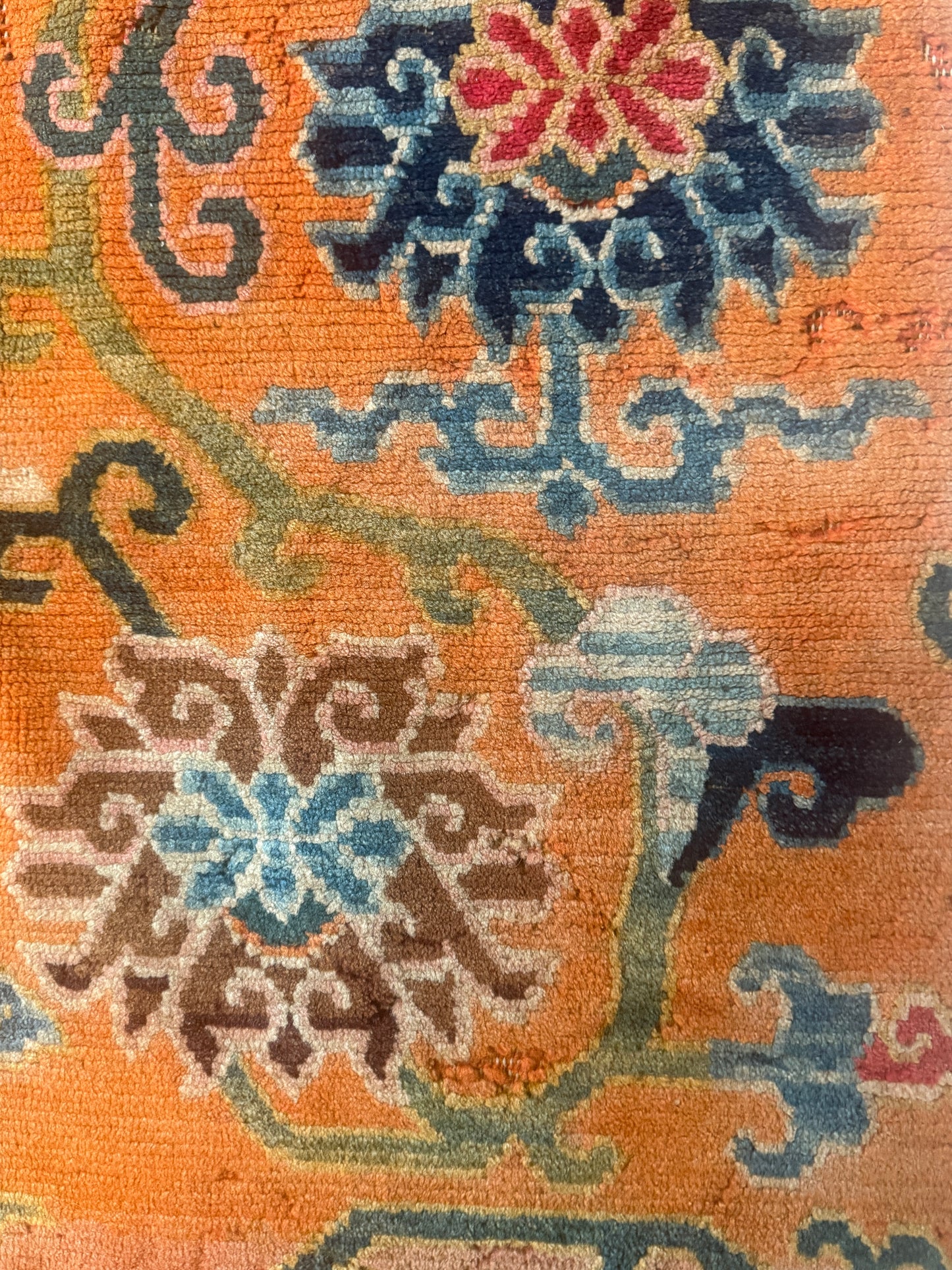 An early 20th C., antique Tibetan floral cushion rug