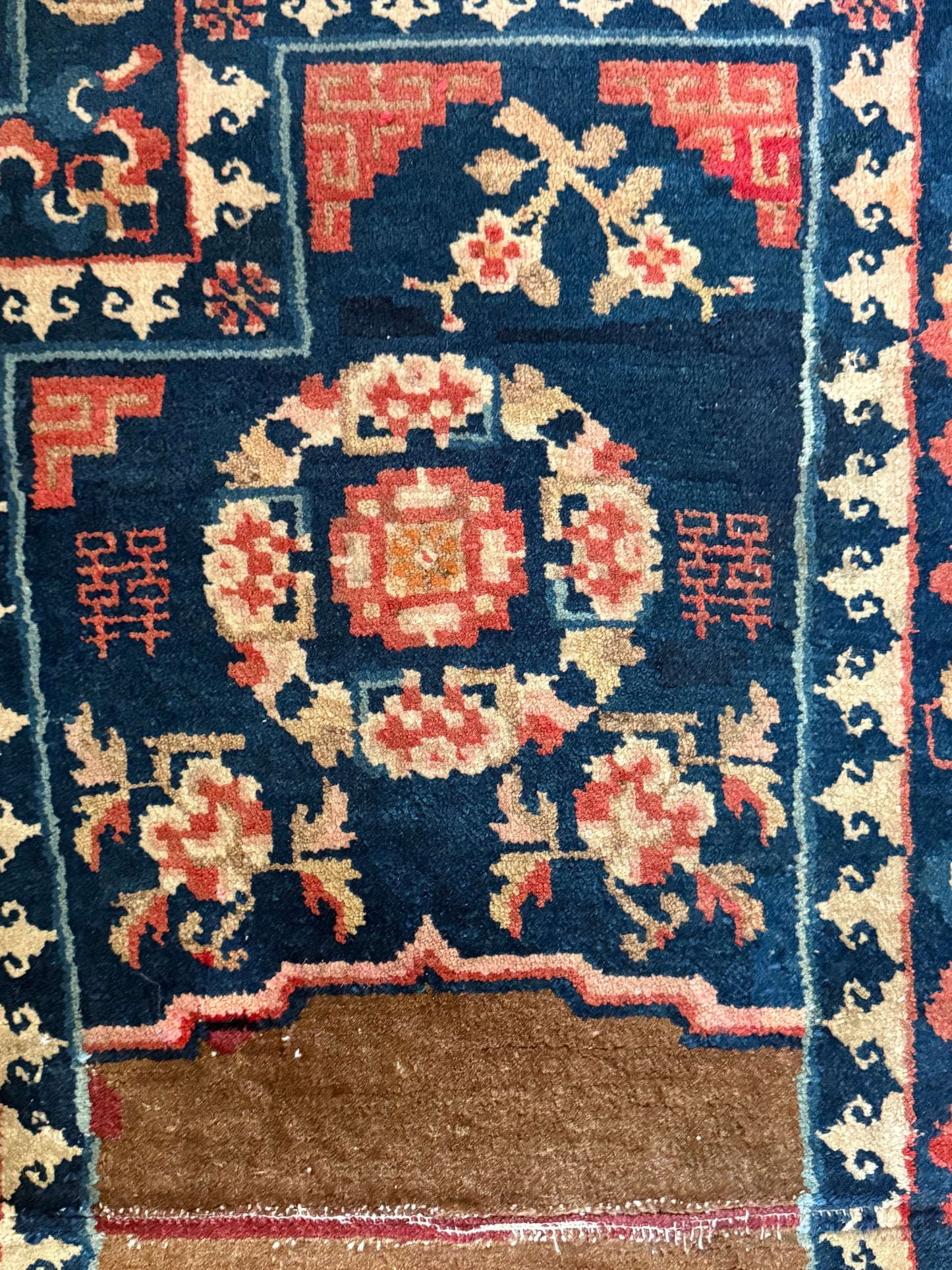 A vintage indigo saddle rug