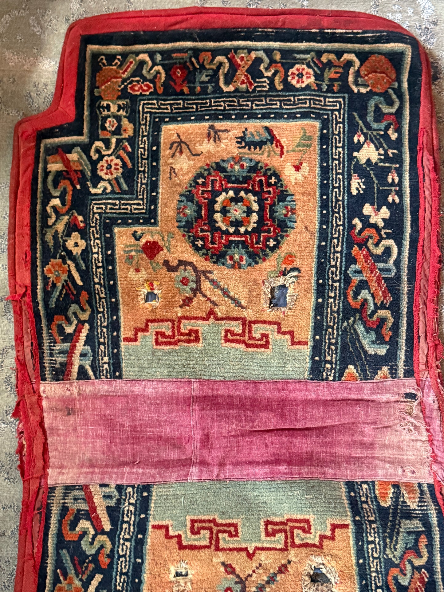 Antique Tibetan saddle rug