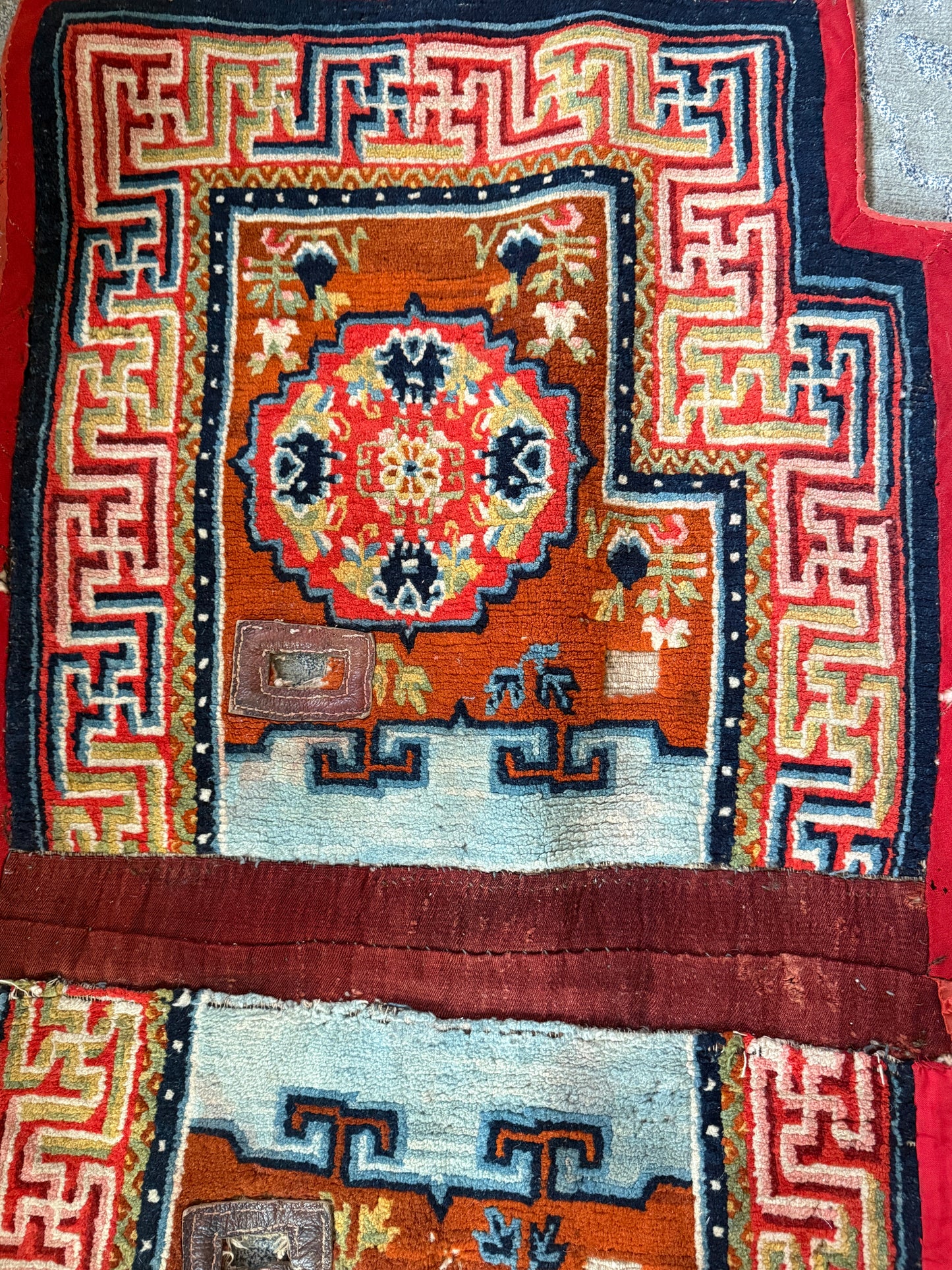 An antique Tibetan saddle rug