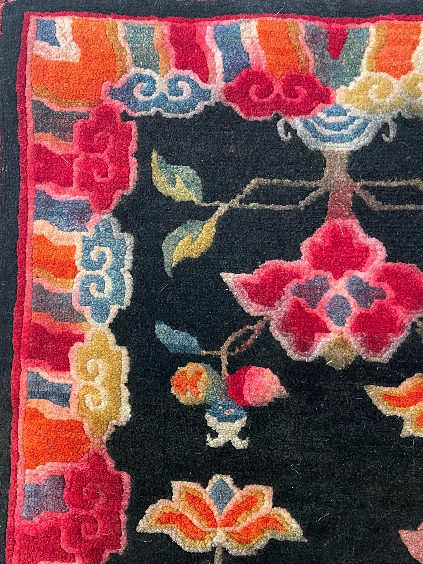 An early 20th C., antique Tibetan floral cushion rug