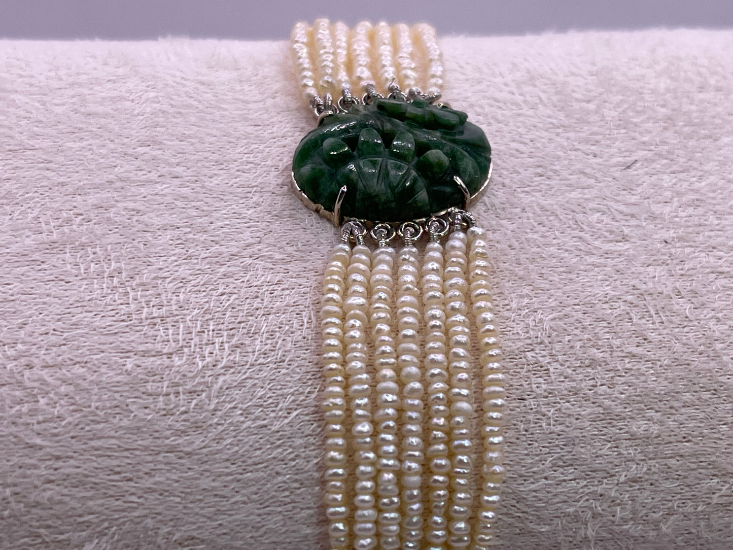 an antique seed pearl and jade plaque bracelet