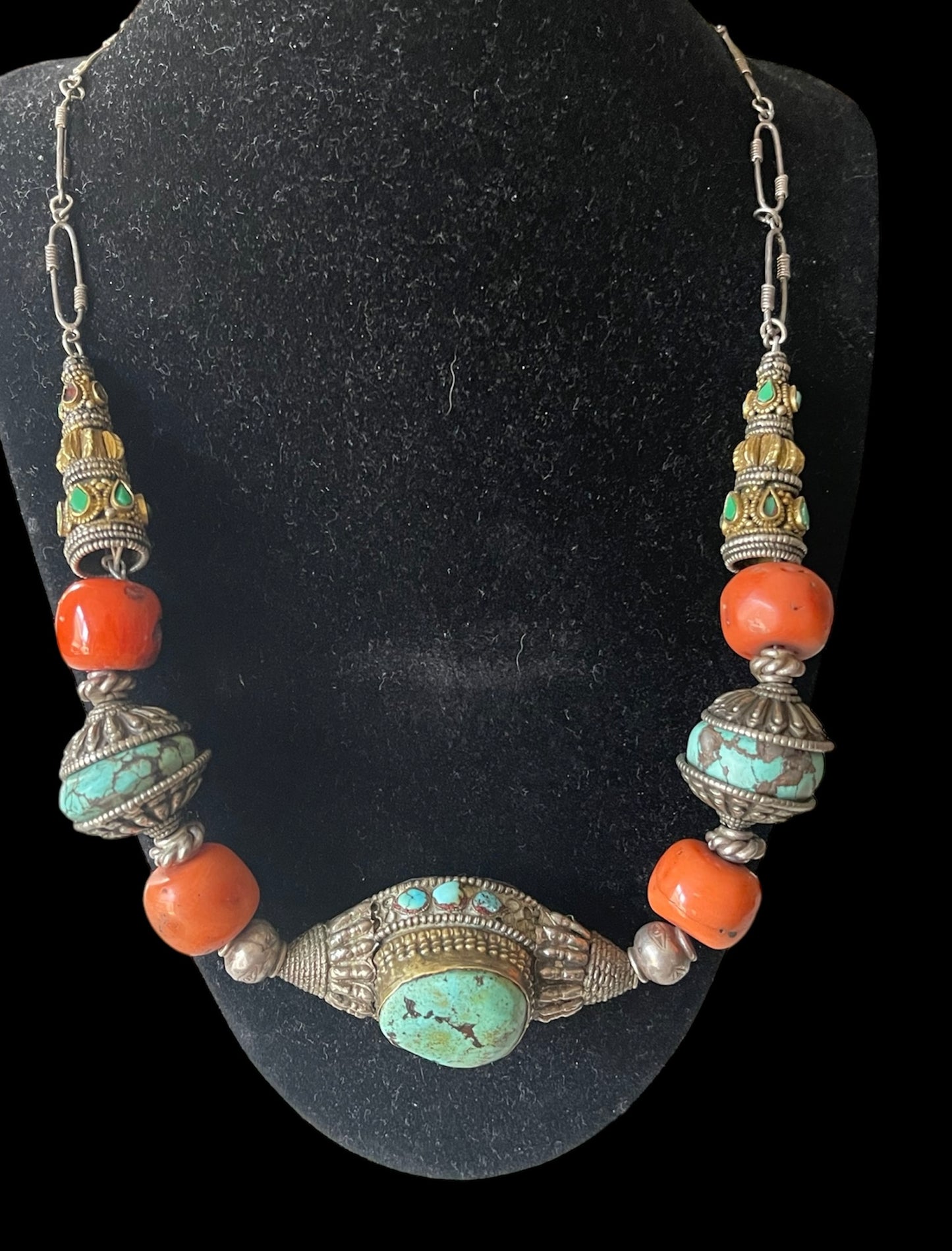 A necklace with antique Tibetan silver beads and coral