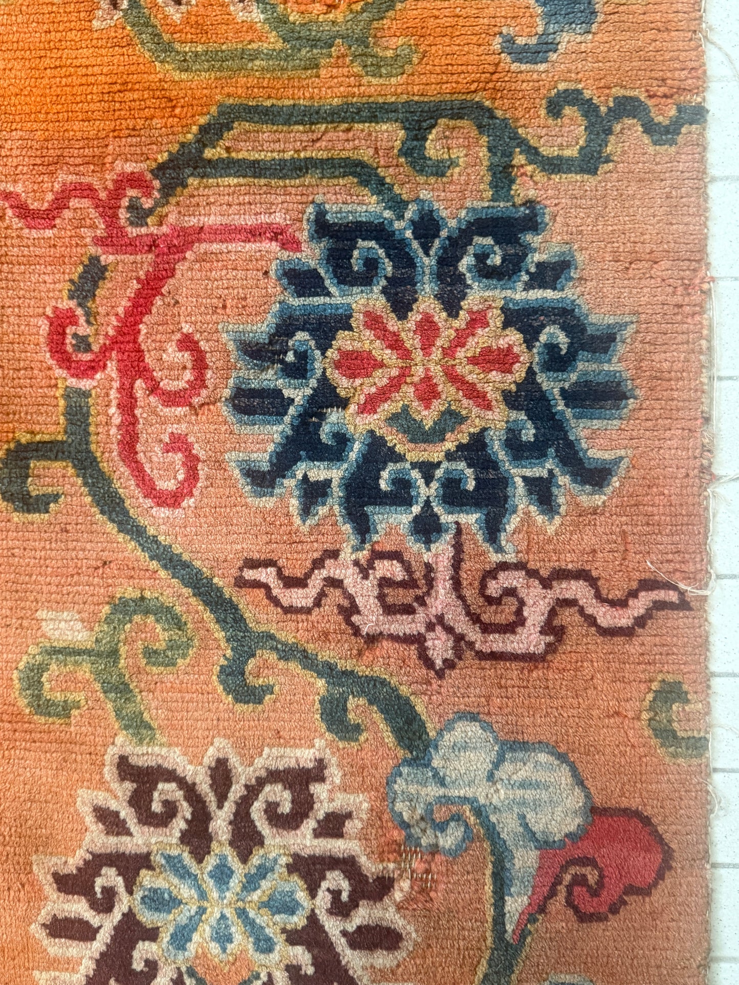 An early 20th C., antique Tibetan floral cushion rug