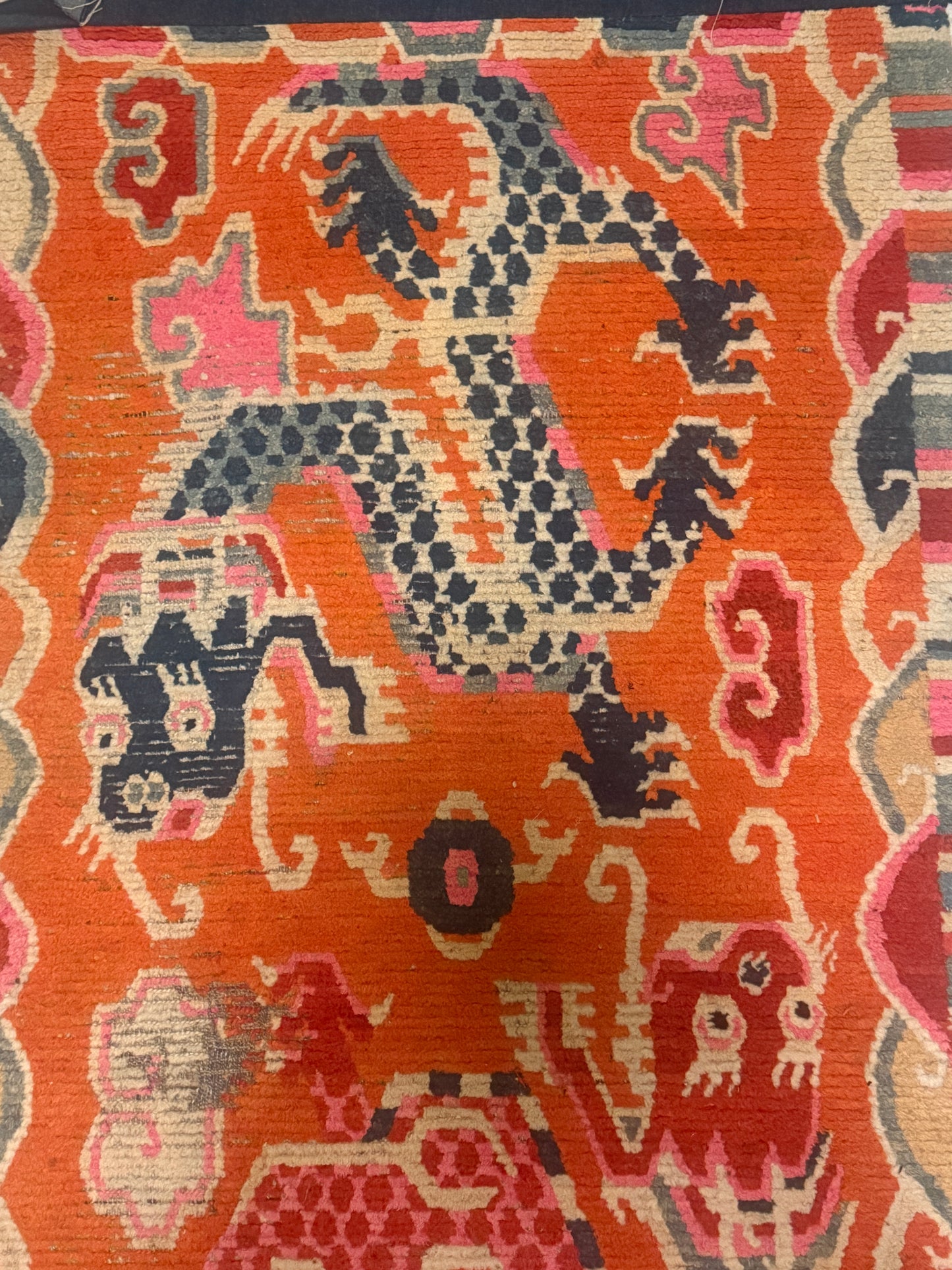 A 19th C., unique antique Tibetan dragon rug