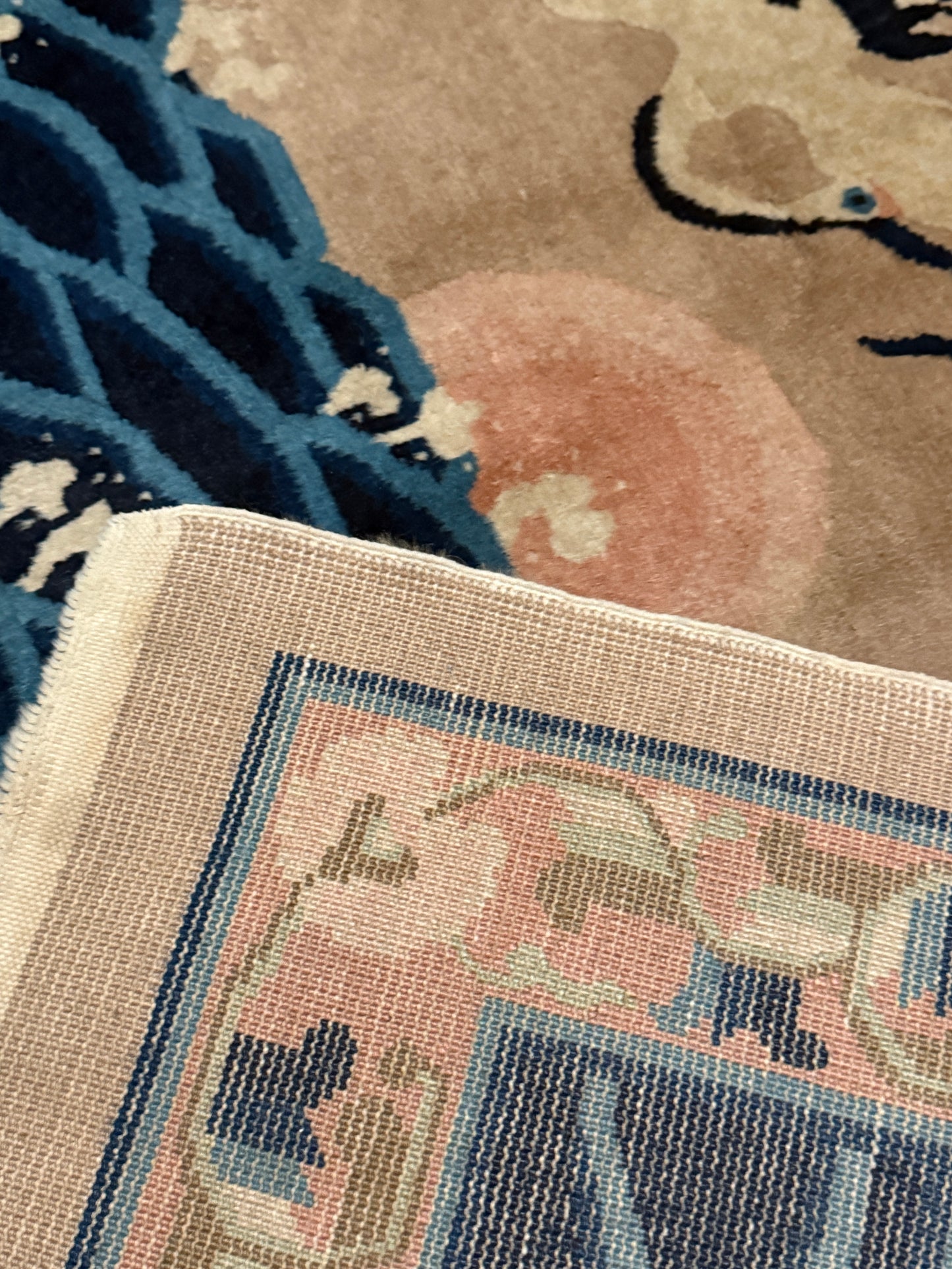 An antique Chinese pictorial rug