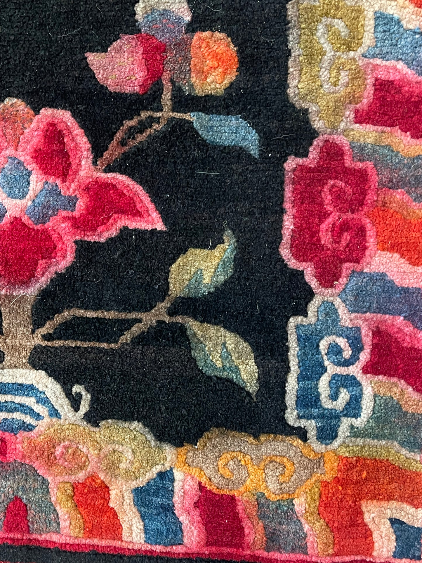 An early 20th C., antique Tibetan floral cushion rug