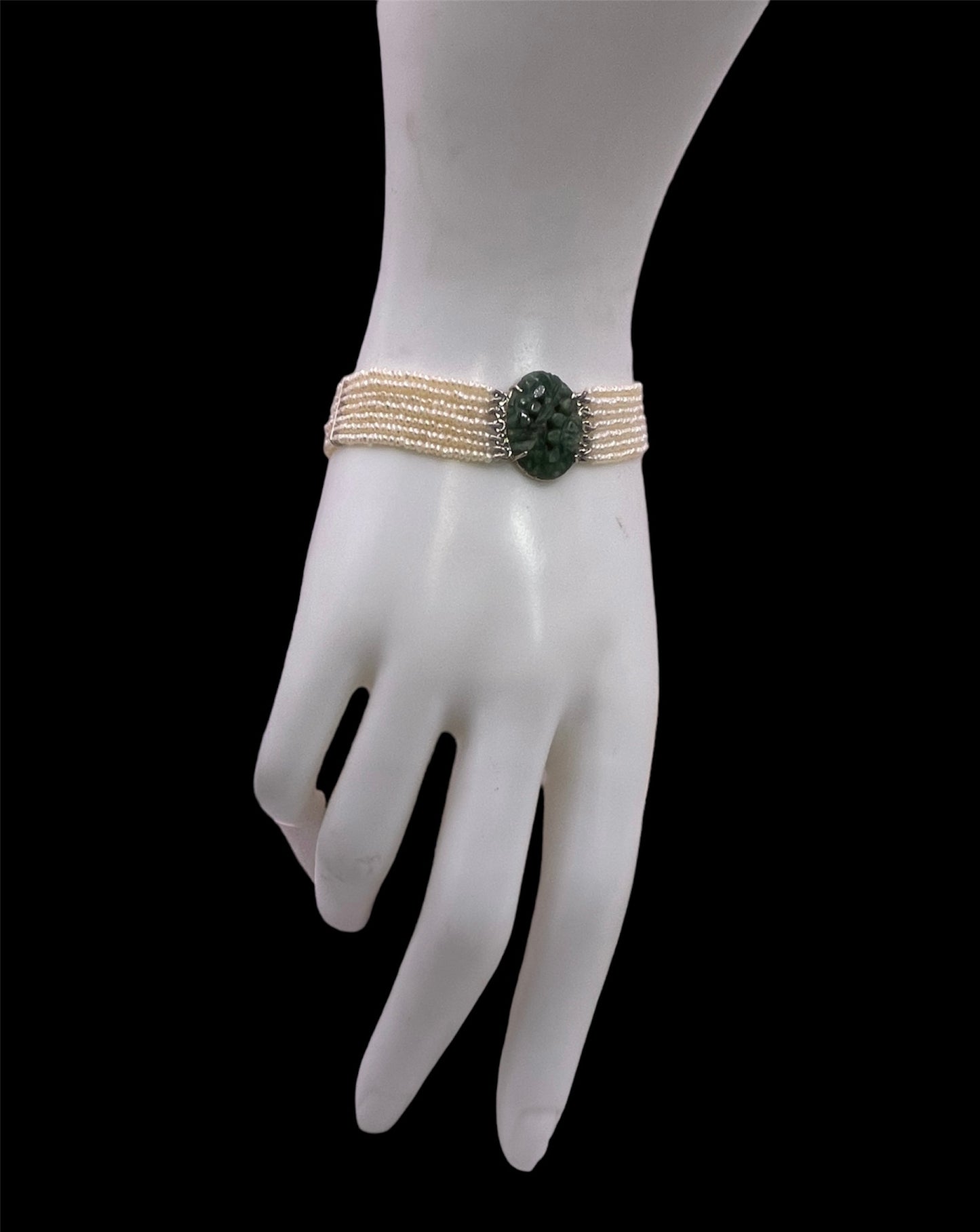 an antique seed pearl and jade plaque bracelet