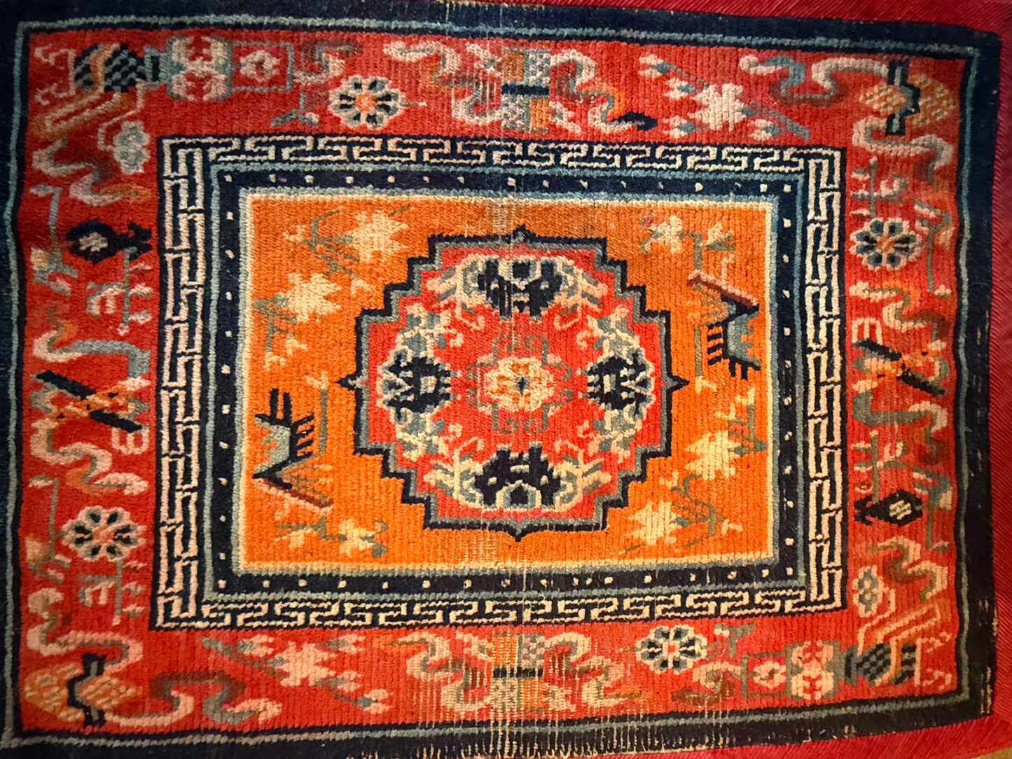 An antique meditation rug / saddle rug topper