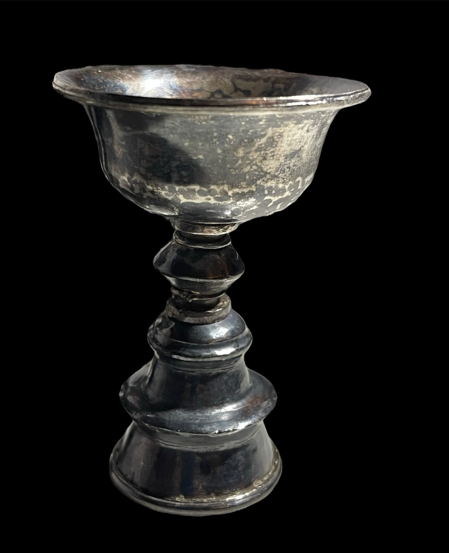 A set of 6 antique Tibetan silver butter lamps