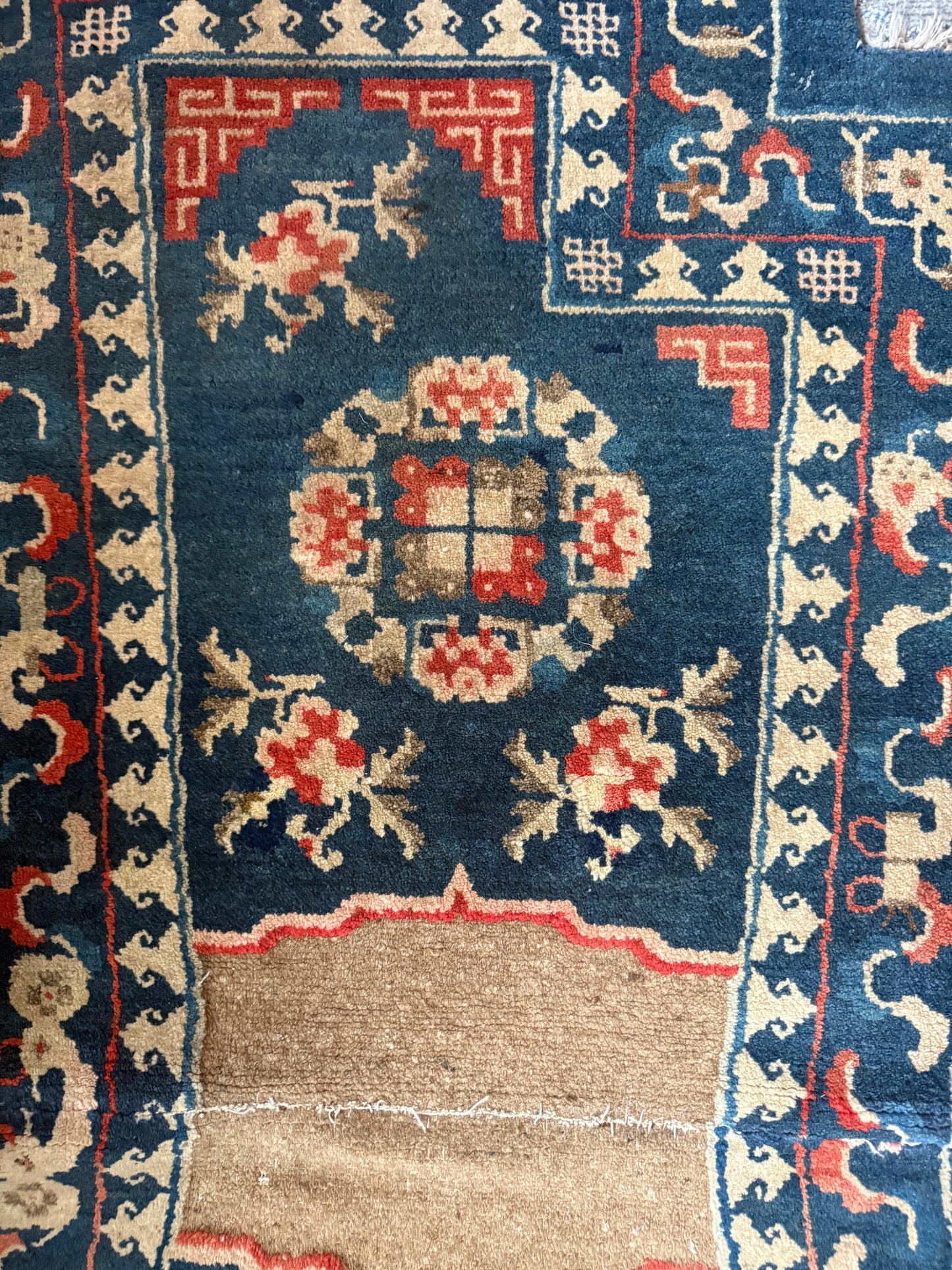 A vintage indigo saddle rug