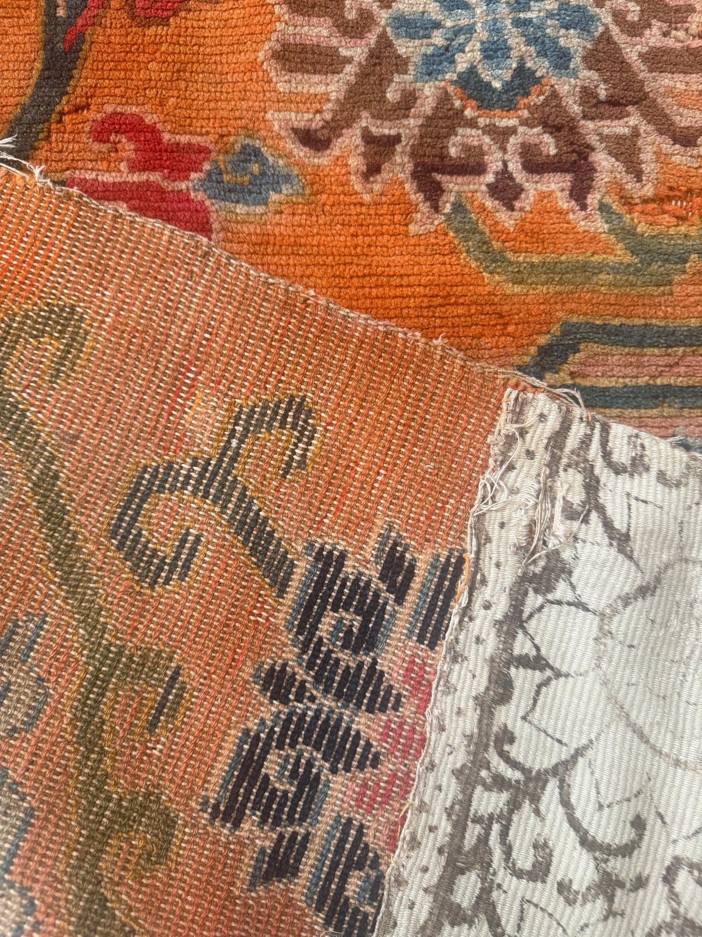 An early 20th C., antique Tibetan floral cushion rug