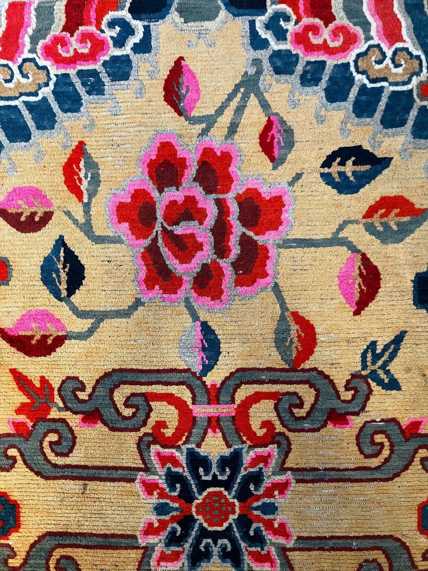 An early 20th C., antique Tibetan floral rug