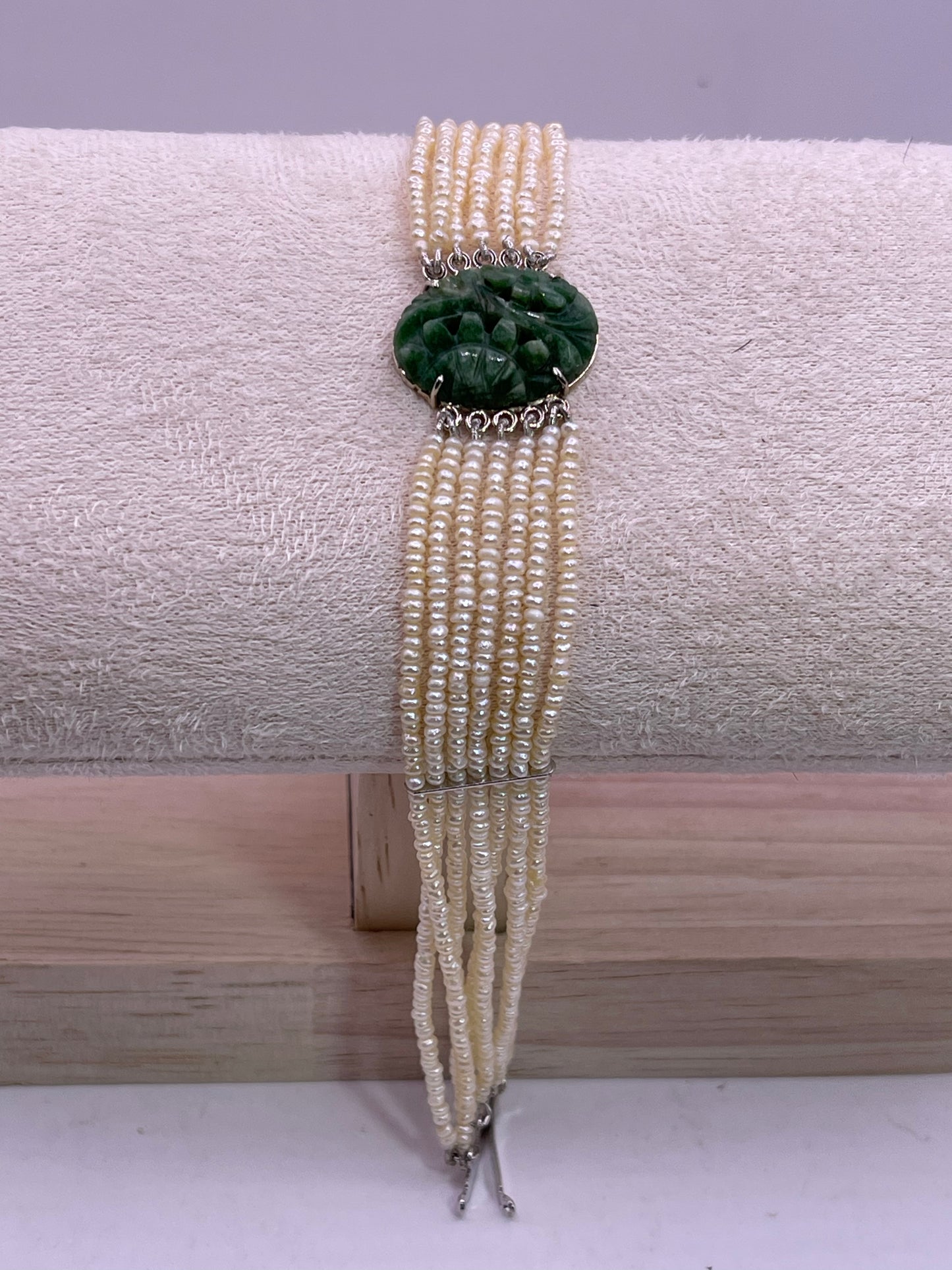 an antique seed pearl and jade plaque bracelet