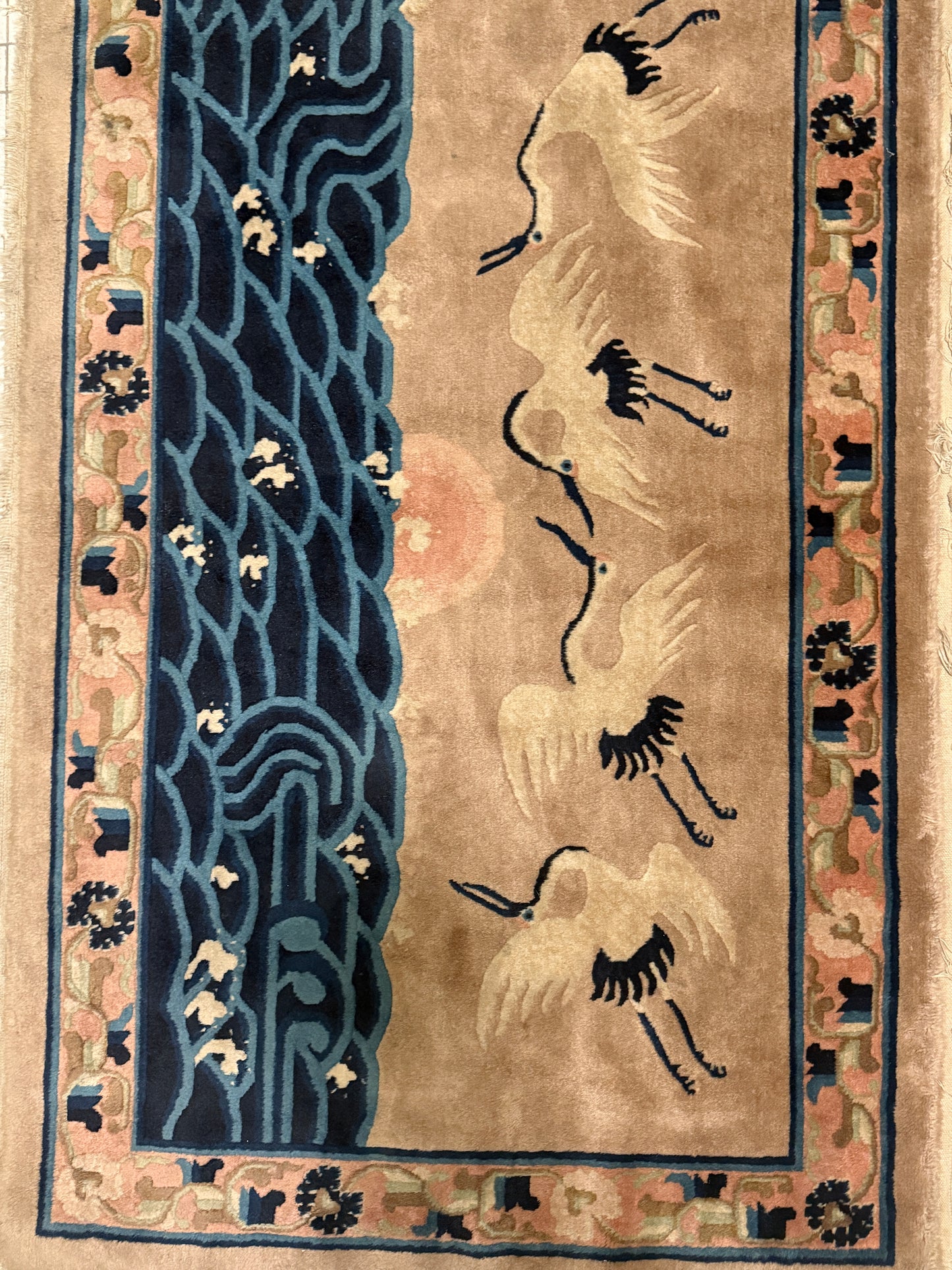 An antique Chinese pictorial rug