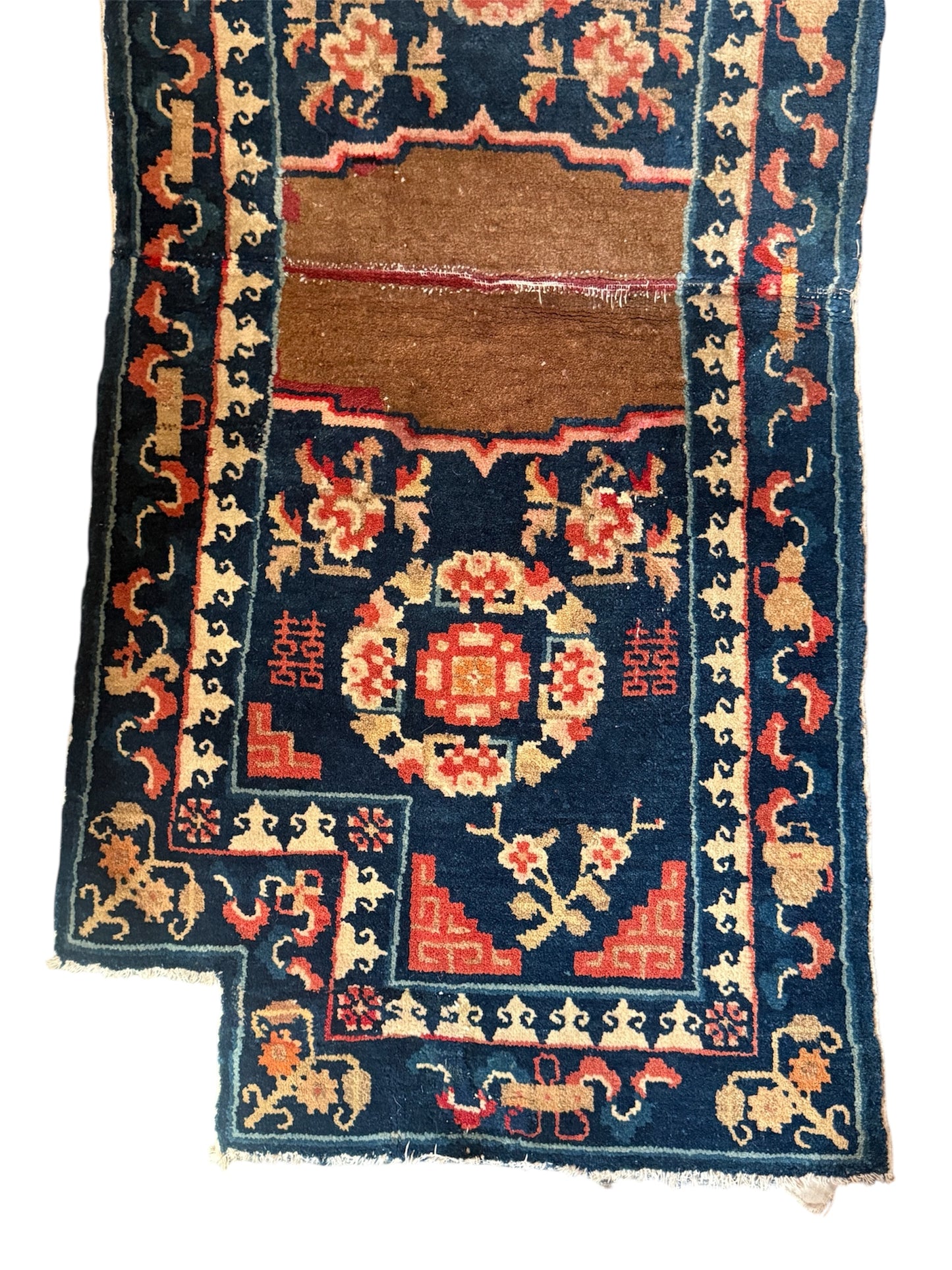 A vintage indigo saddle rug