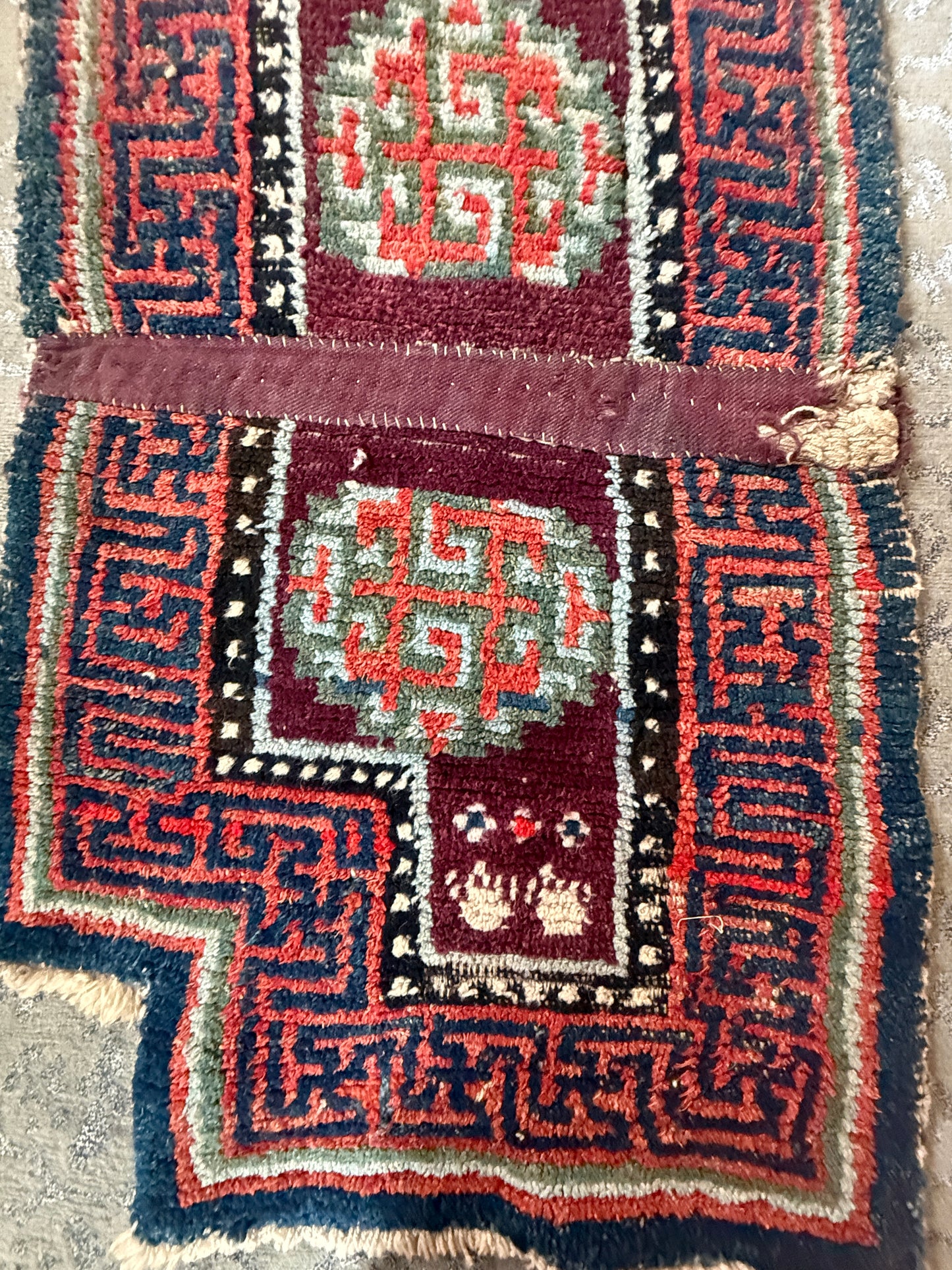 Antique Tibetan saddle rug
