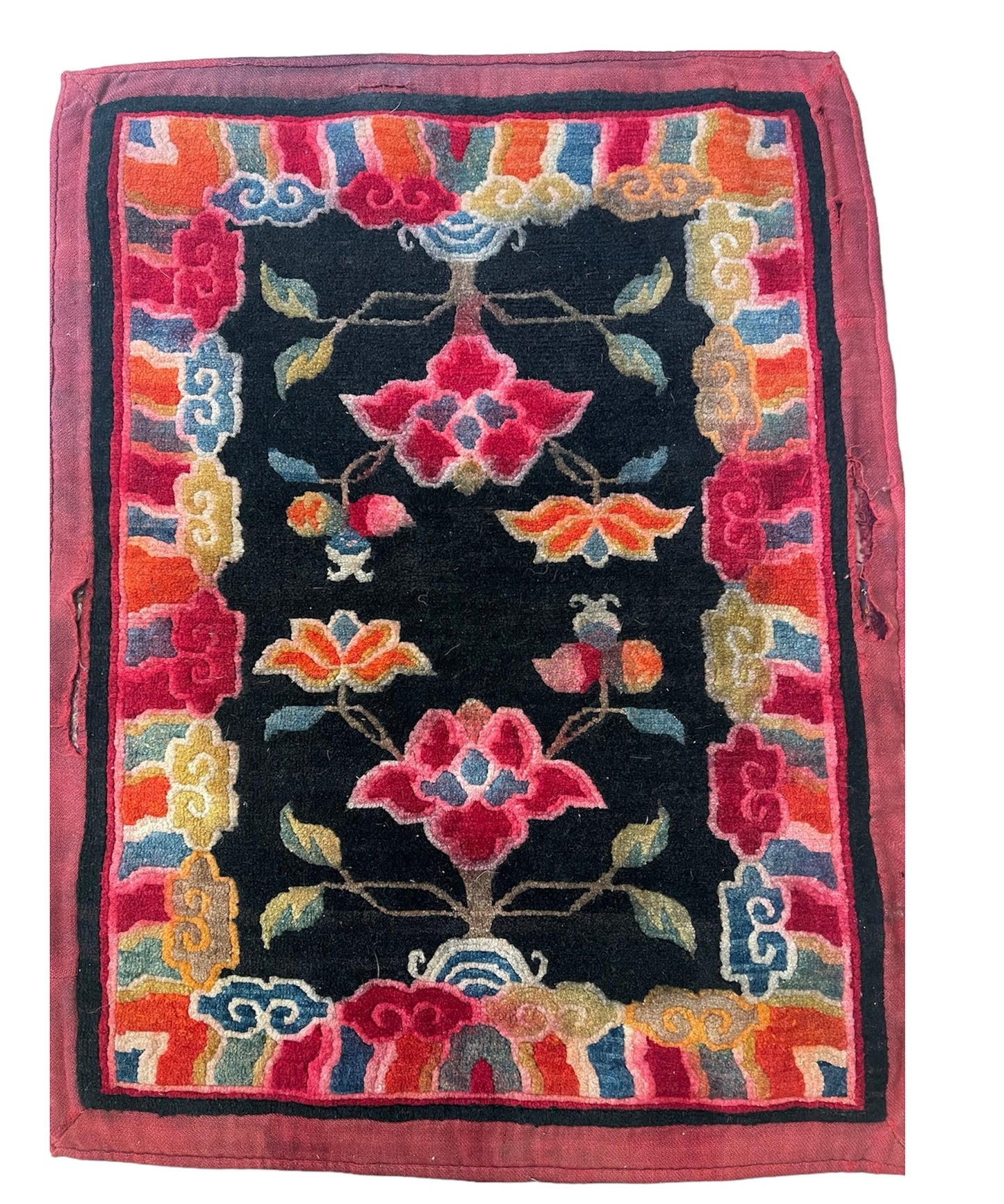 An early 20th C., antique Tibetan floral cushion rug