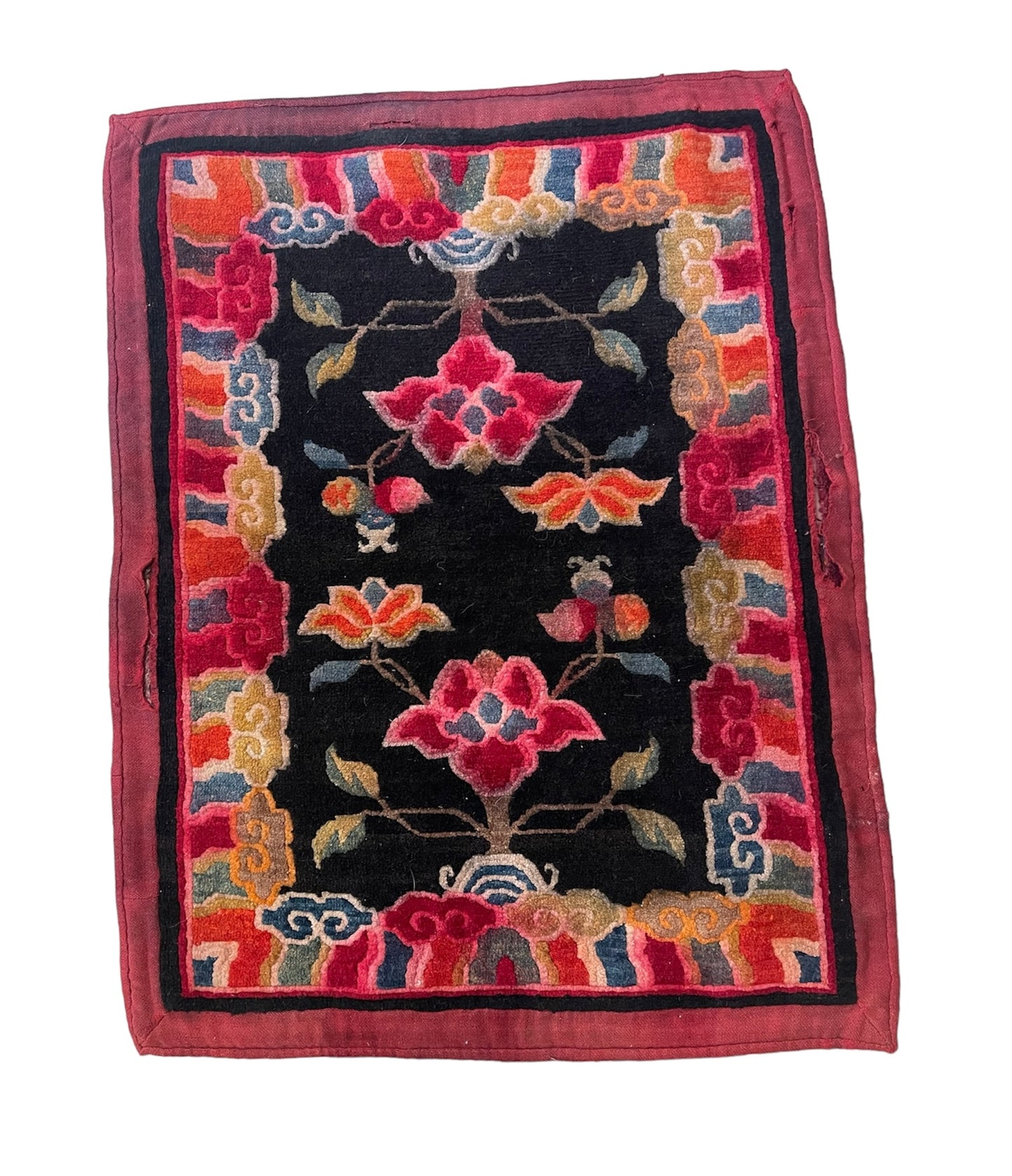 An early 20th C., antique Tibetan floral cushion rug