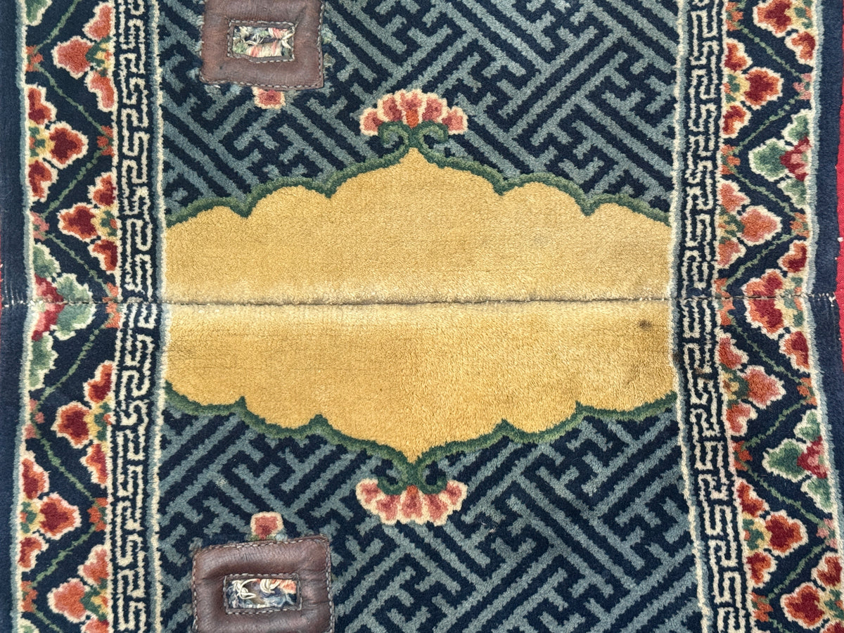 A mid 20th C. Tibetan saddle rug