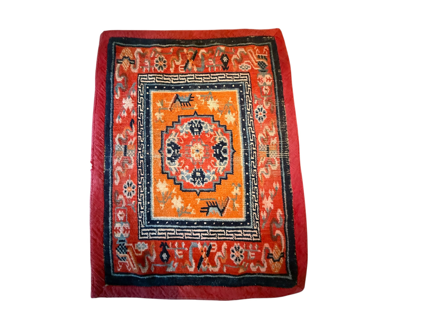 An antique meditation rug / saddle rug topper