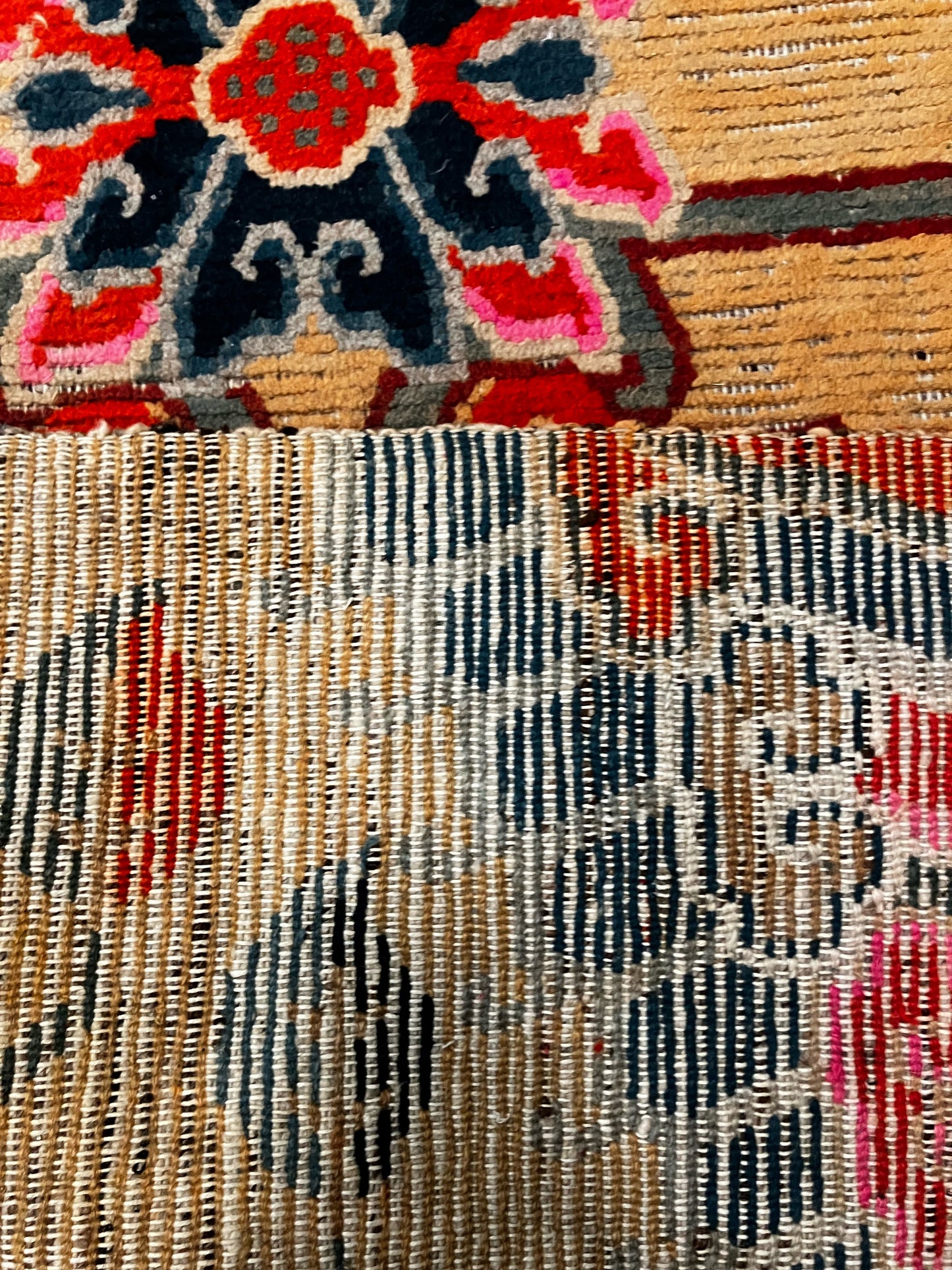 An early 20th C., antique Tibetan floral rug
