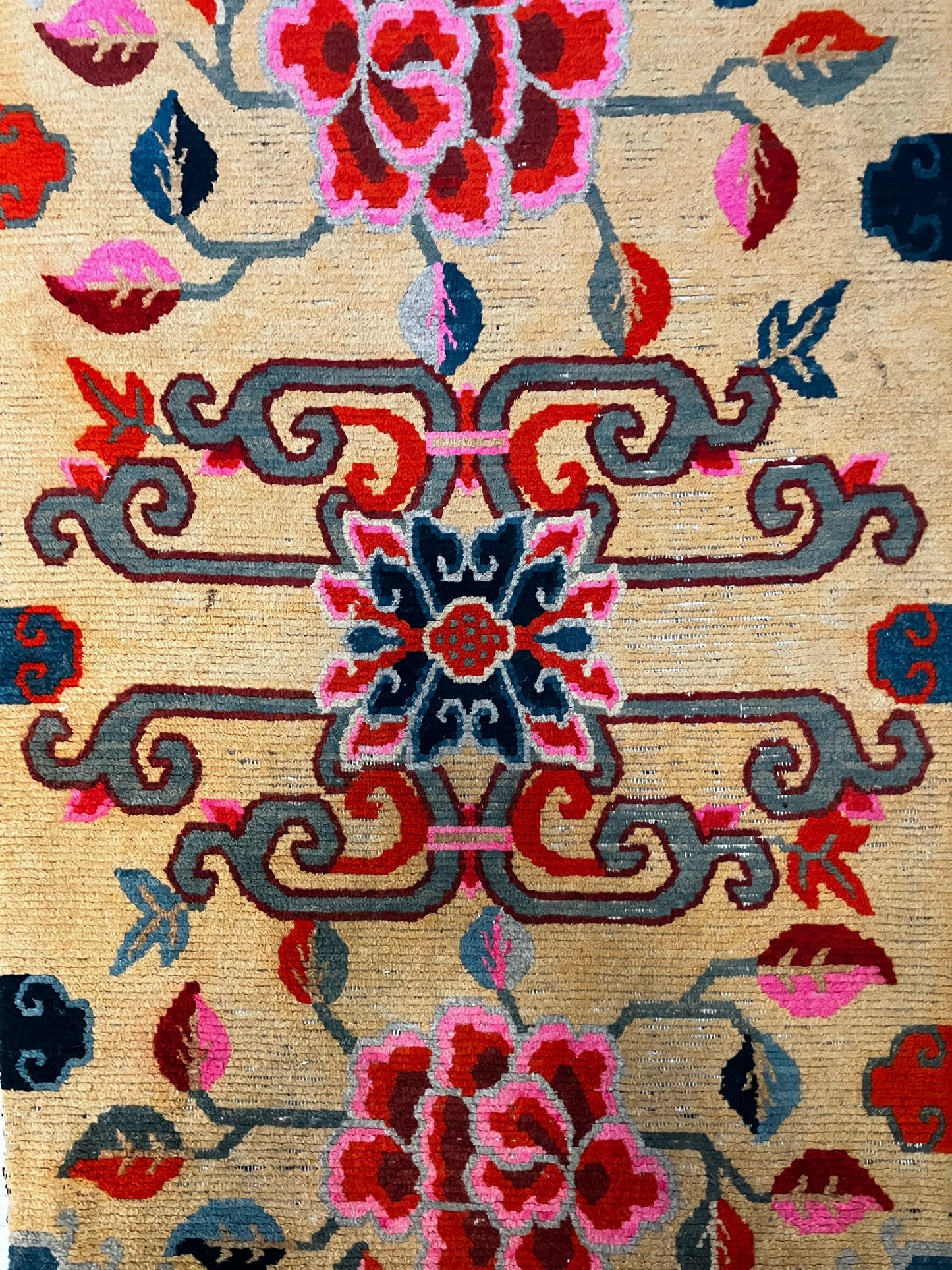 An early 20th C., antique Tibetan floral rug