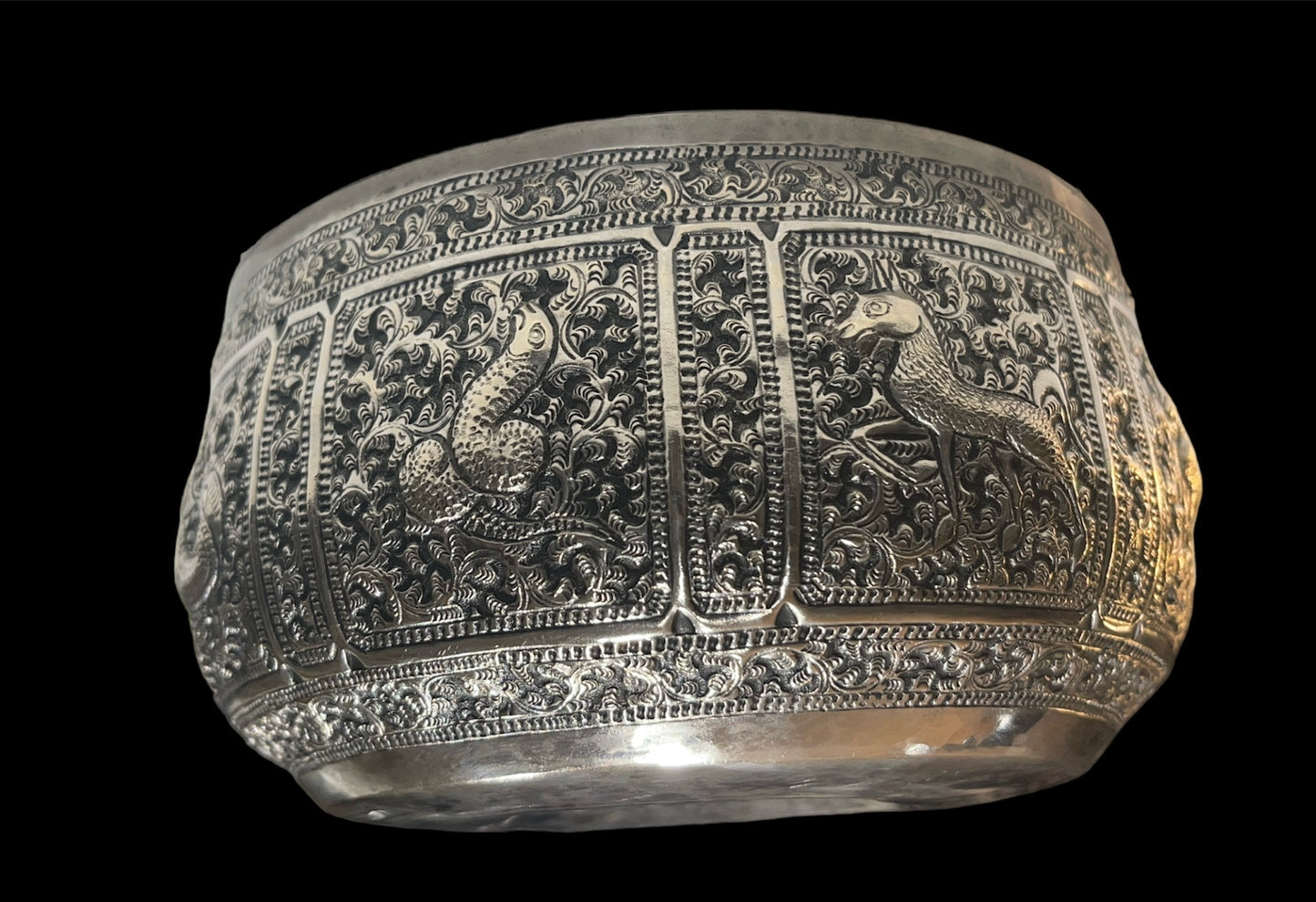 An antique south East Asian silver repousse bowl