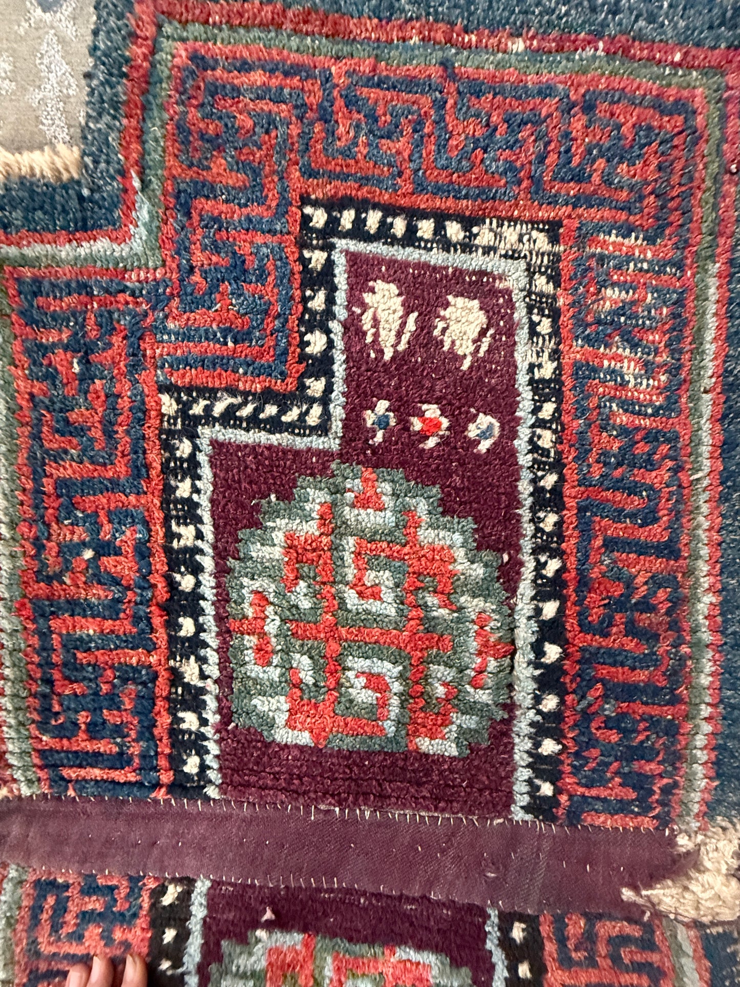 Antique Tibetan saddle rug