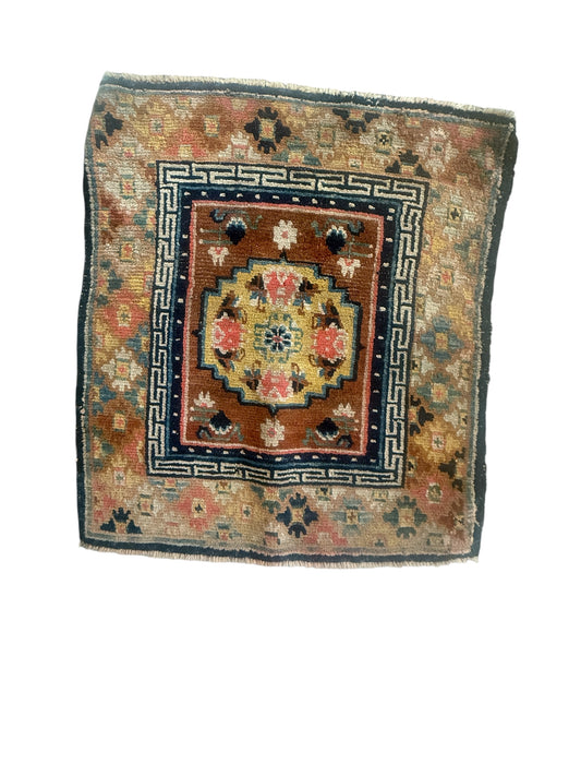 Antique meditation seat rug