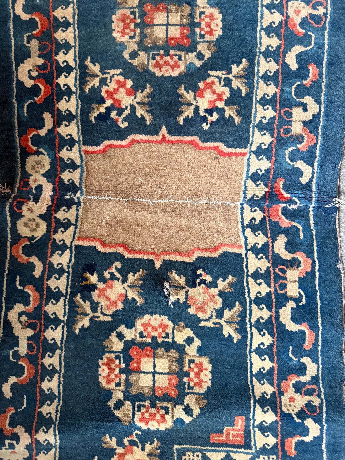 A vintage indigo saddle rug