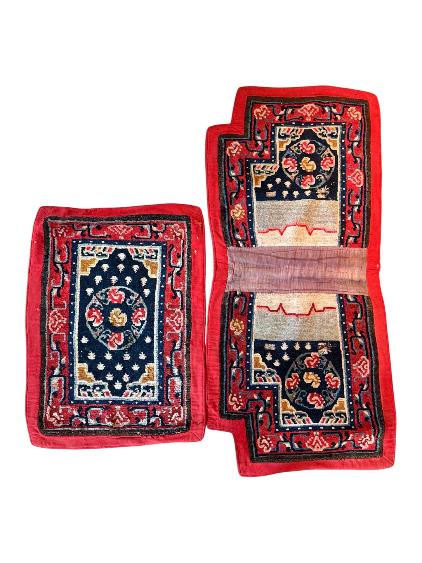An antique Tibetan saddle rug and rug topper set