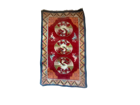 An antique Tibetan rug