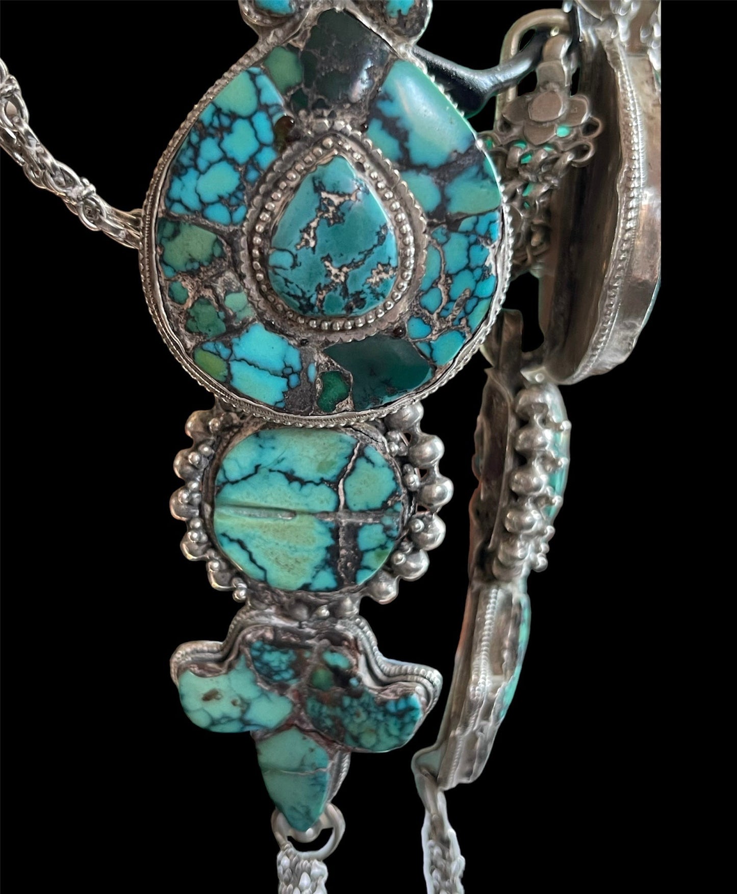 A pair of antique Tibetan earrings -aykhor
