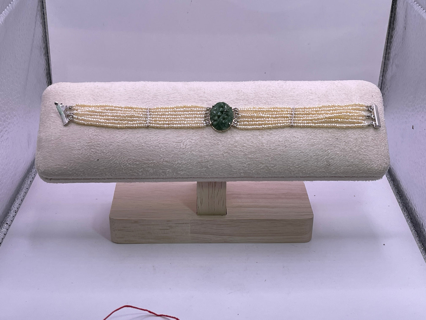 an antique seed pearl and jade plaque bracelet