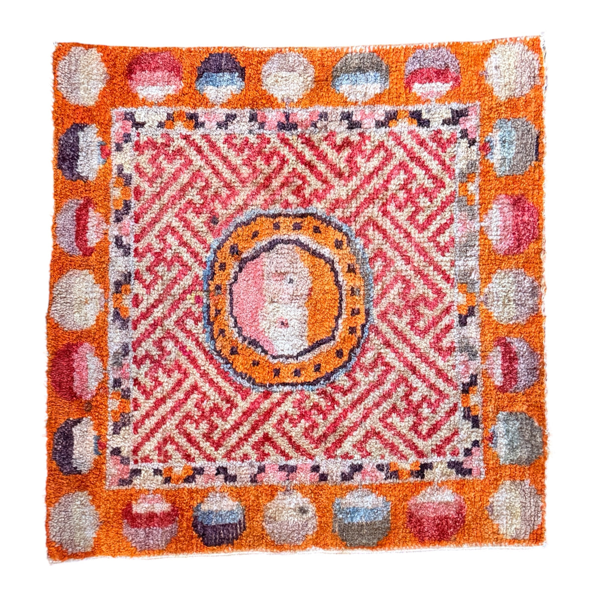Antique meditation seat rug with unique circular motifs