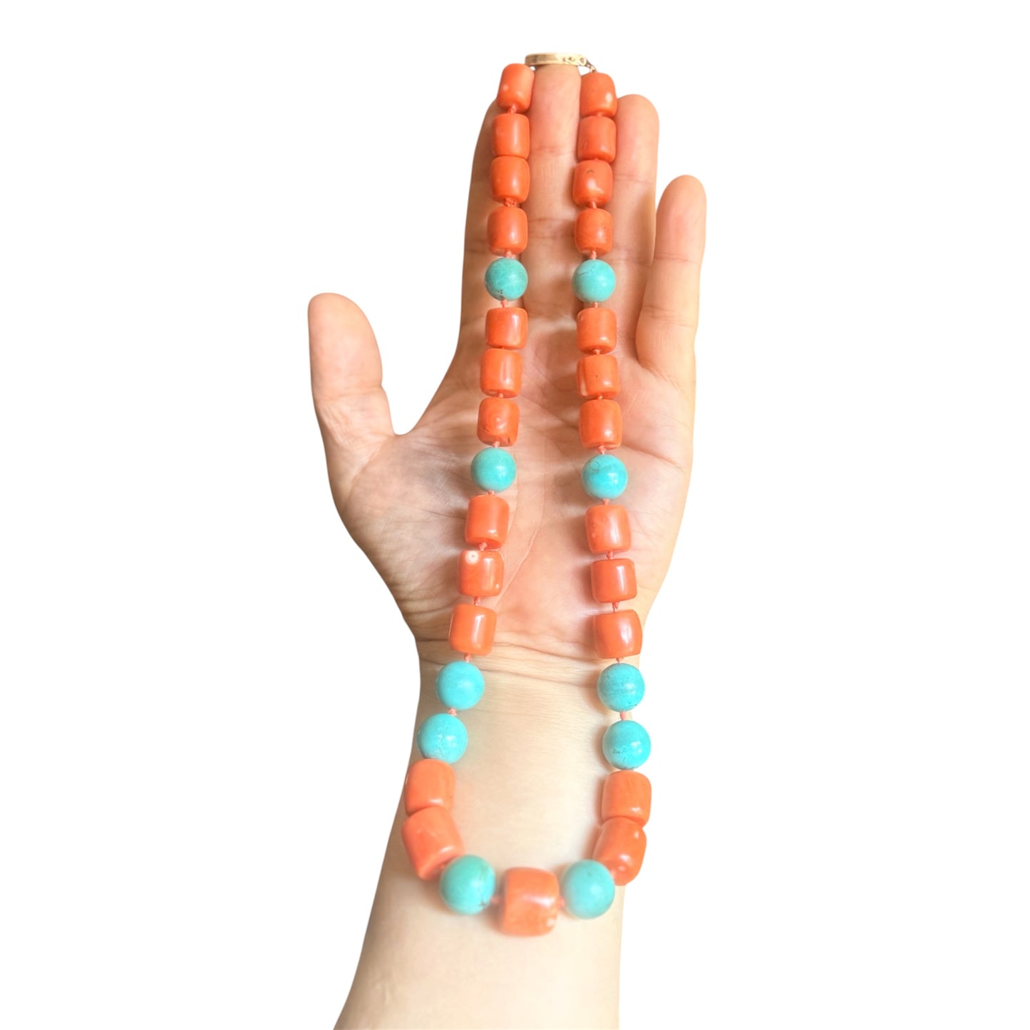 A coral and turquoise bead necklace