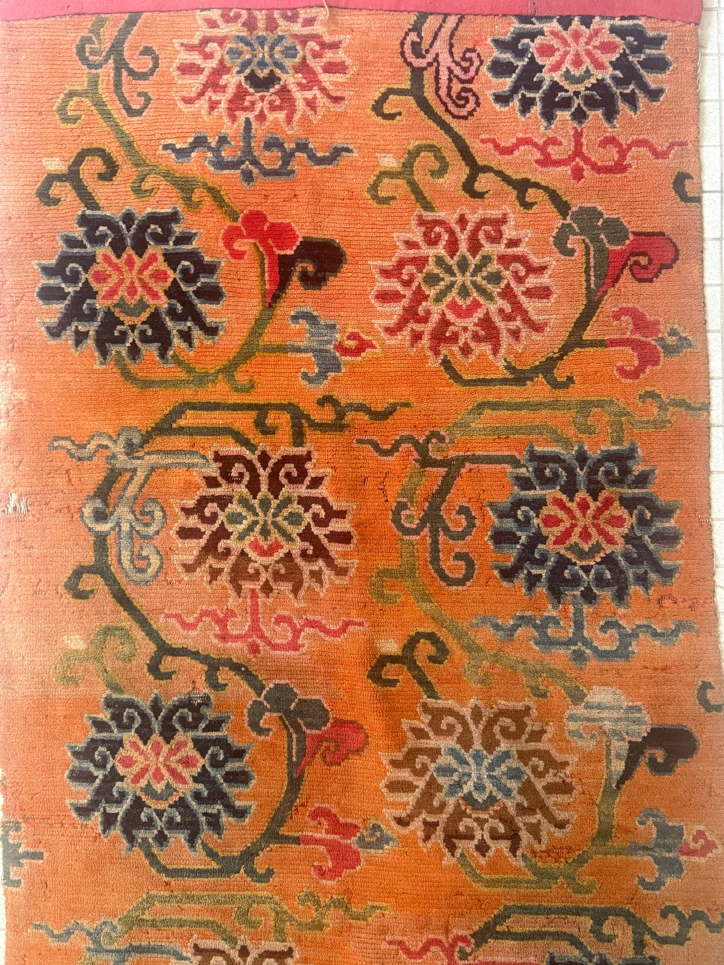 An early 20th C., antique Tibetan floral cushion rug