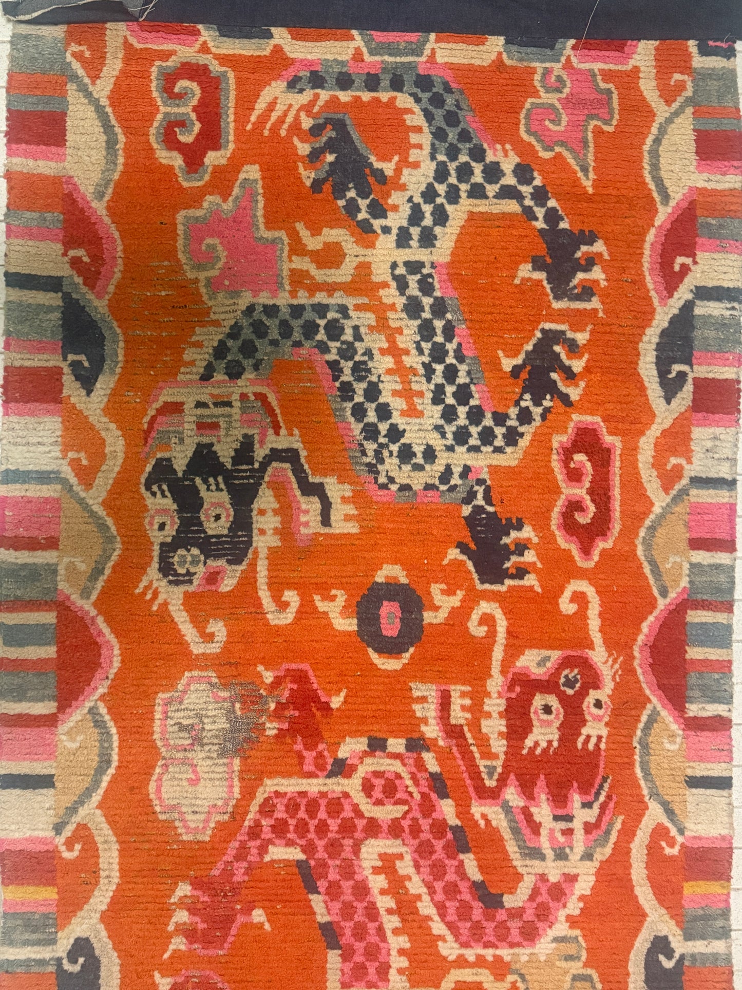 A 19th C., unique antique Tibetan dragon rug