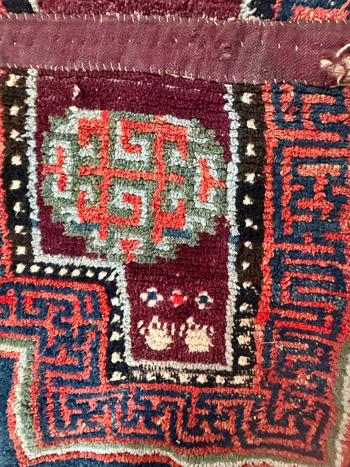 Antique Tibetan saddle rug