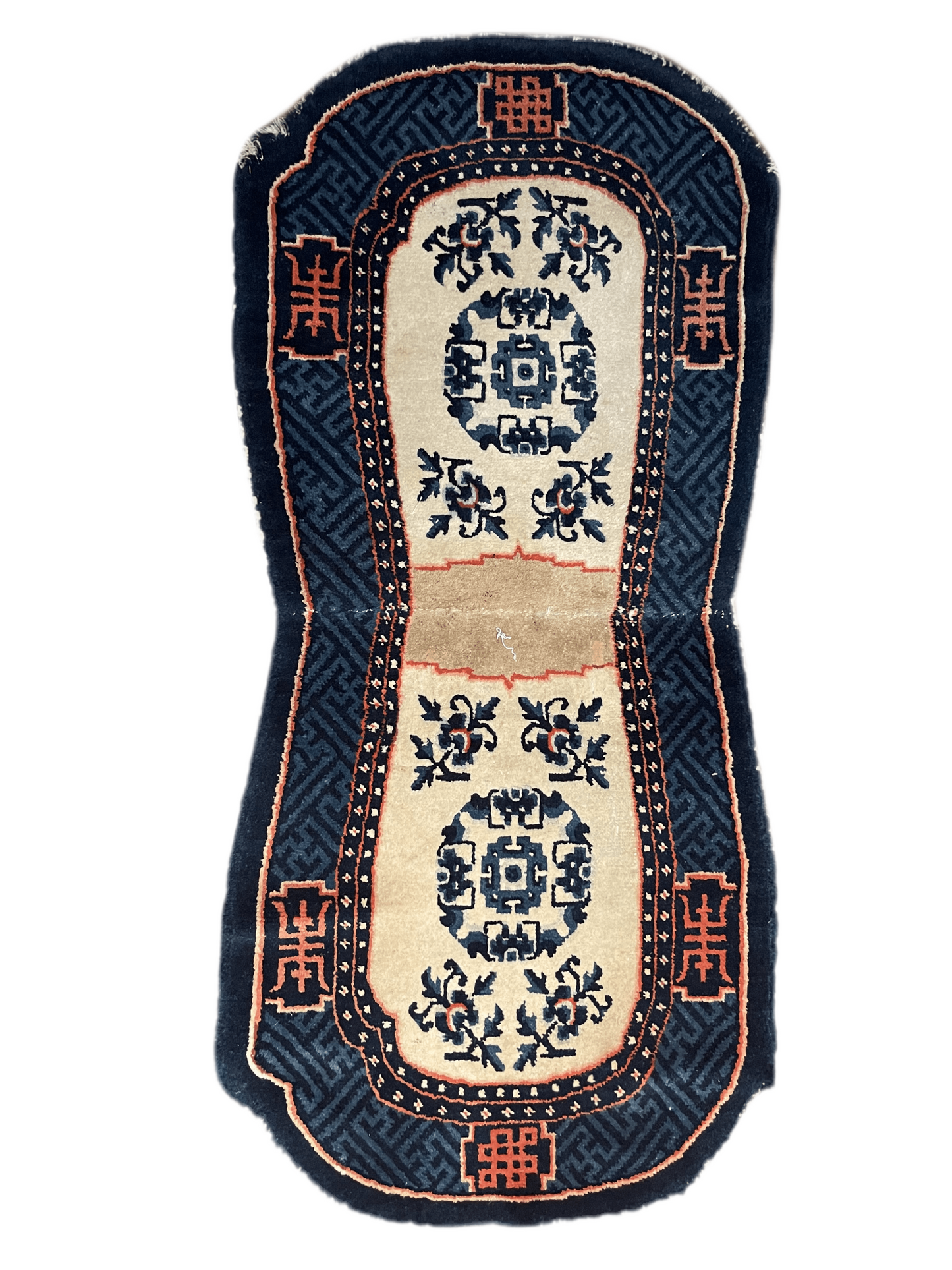A vintage Tibetan indigo rounded woolen saddle rug