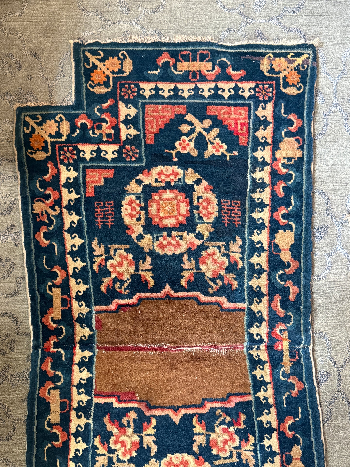 A vintage indigo saddle rug