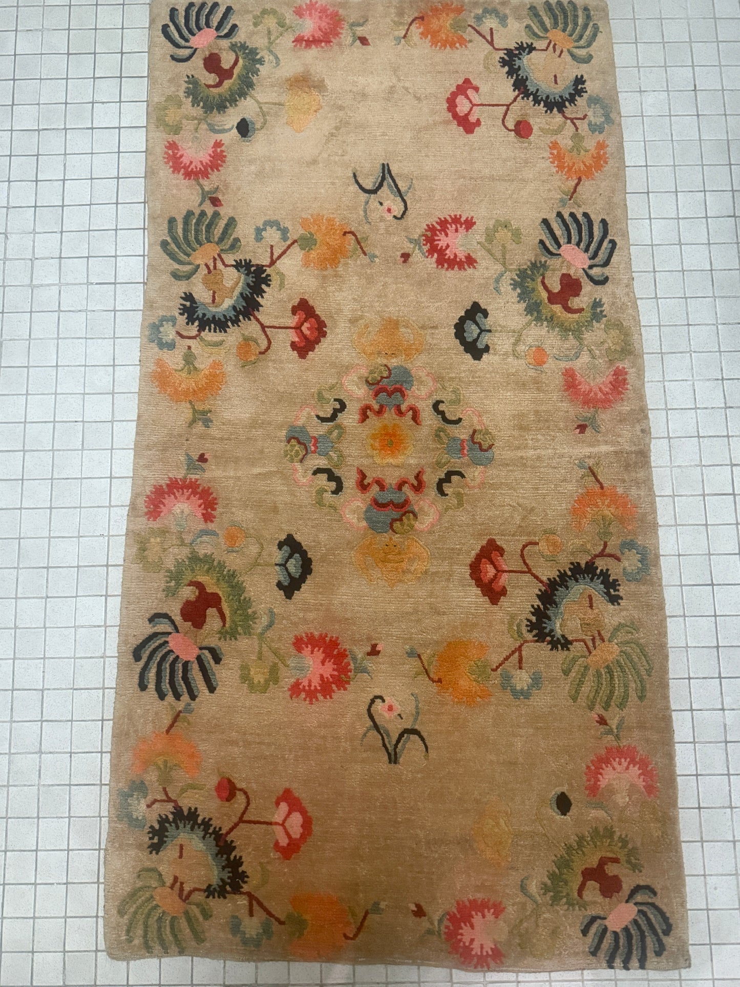 A mid 20th C., Tibetan modern floral rug