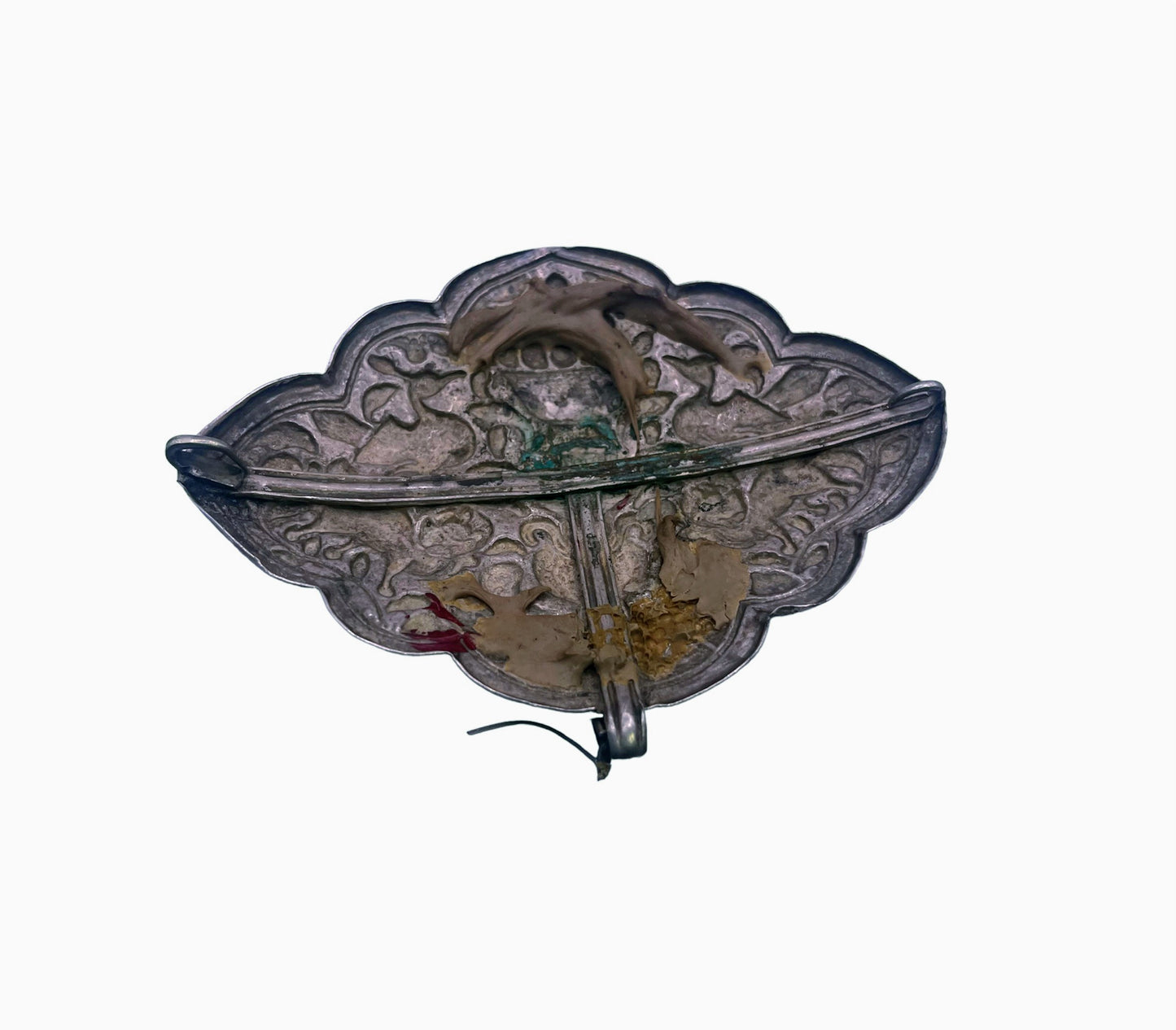An antique Tibetan silver belt buckle