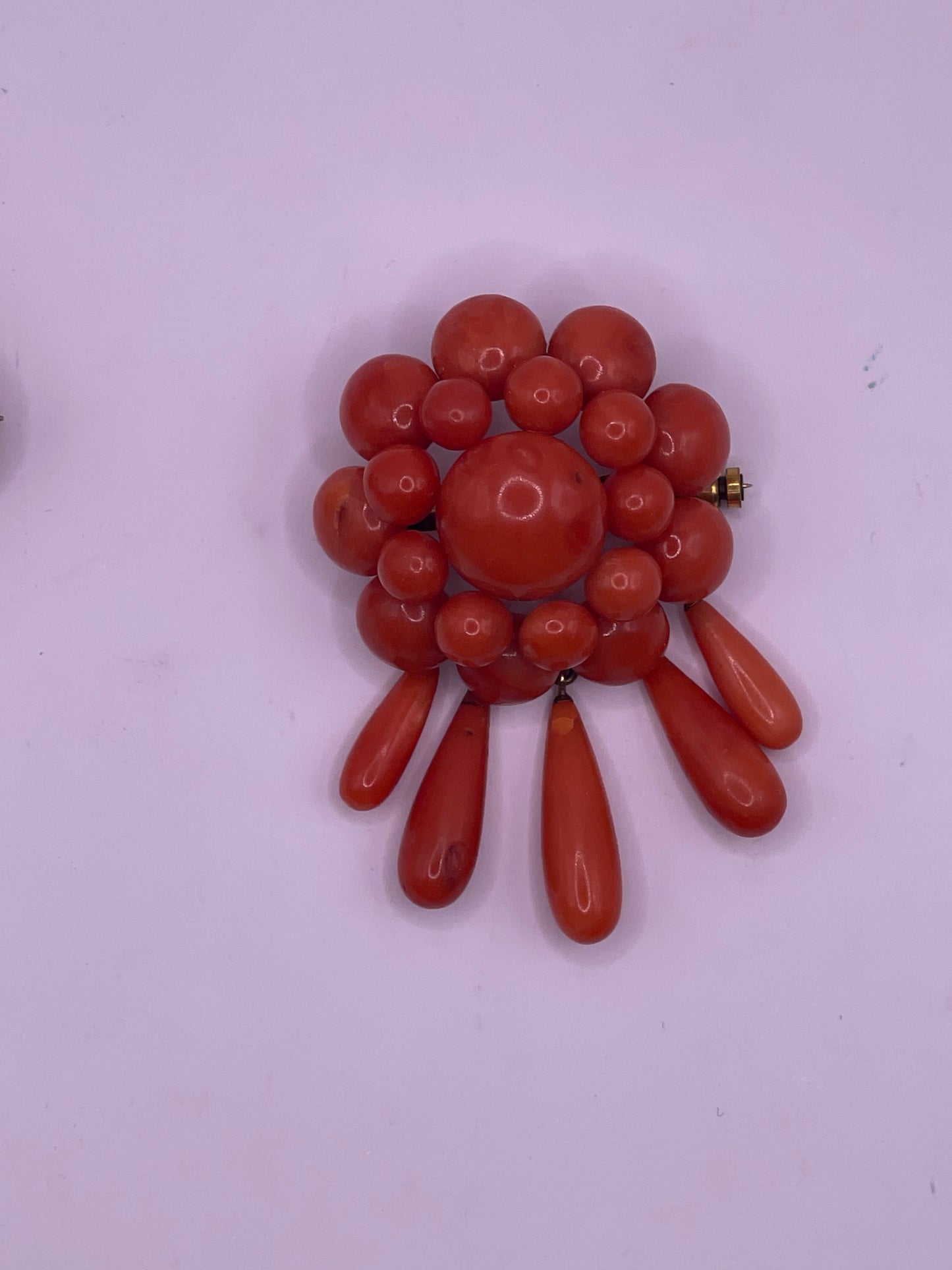 A natural untreated coral orange/ pink pin/ pendant