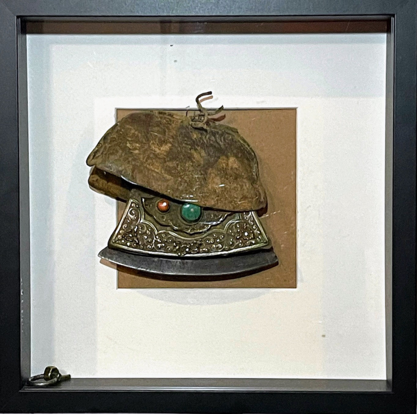 An antique framed Tibetan mechak- flint purse with leather cover