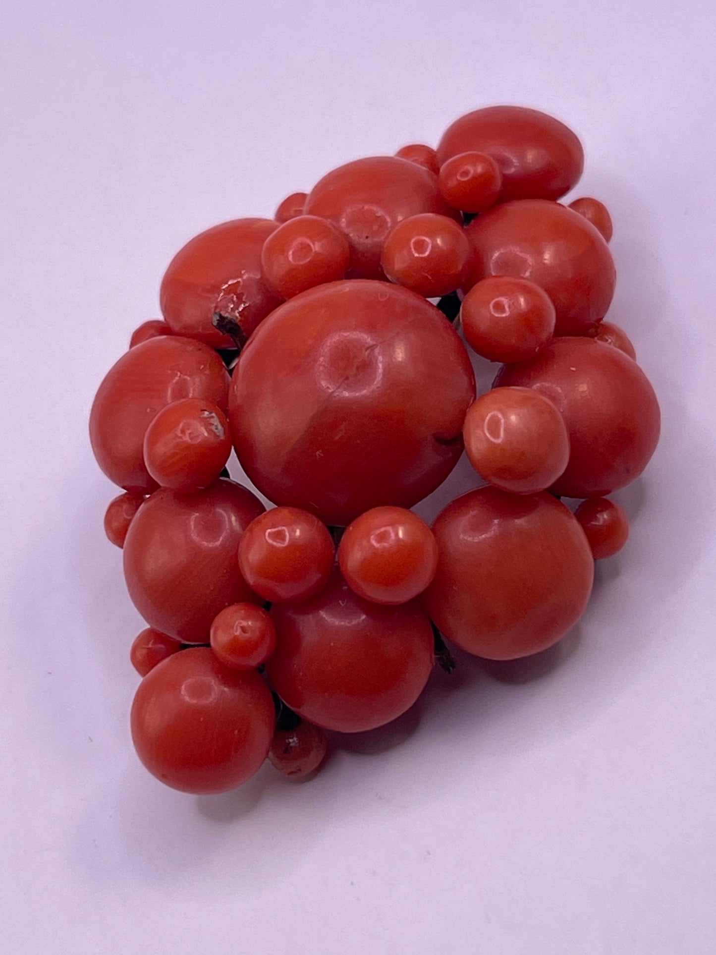 A natural untreated coral orange/ pink pin/ pendant