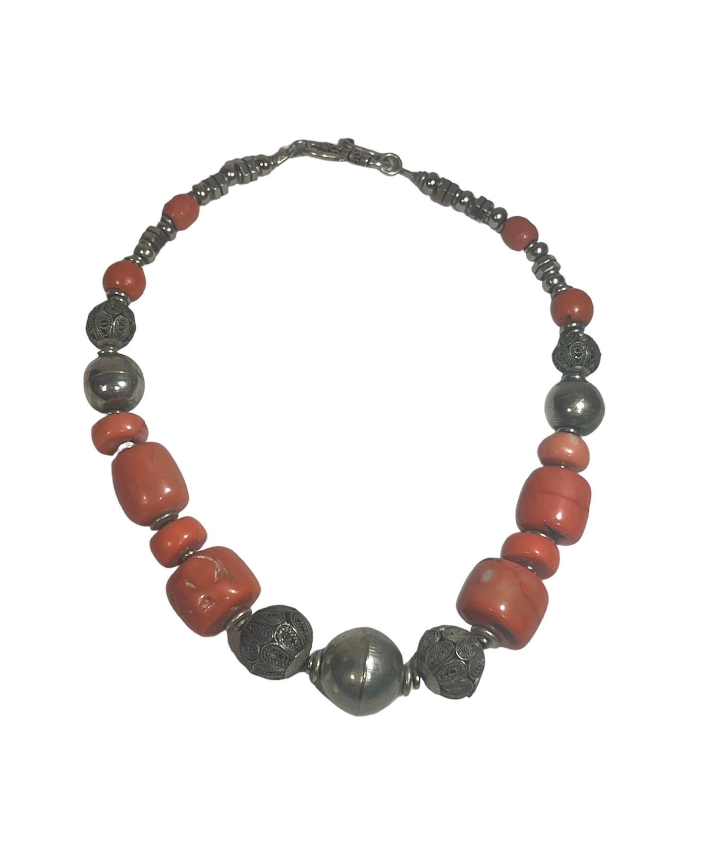 A coral and silver necklace