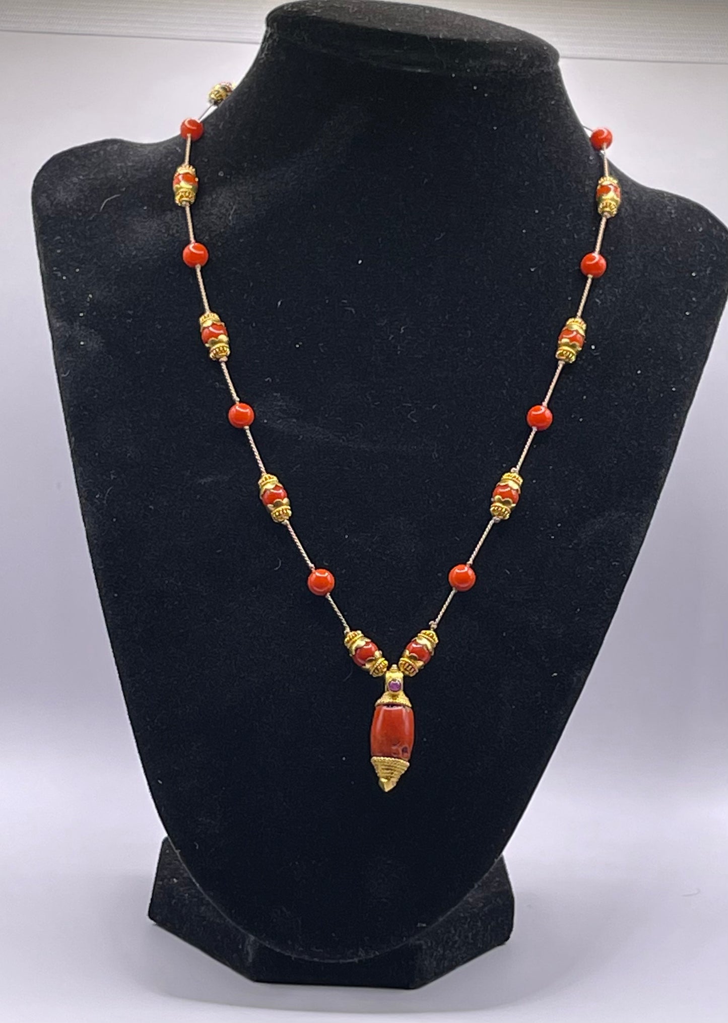 A 18kt gold and coral necklace