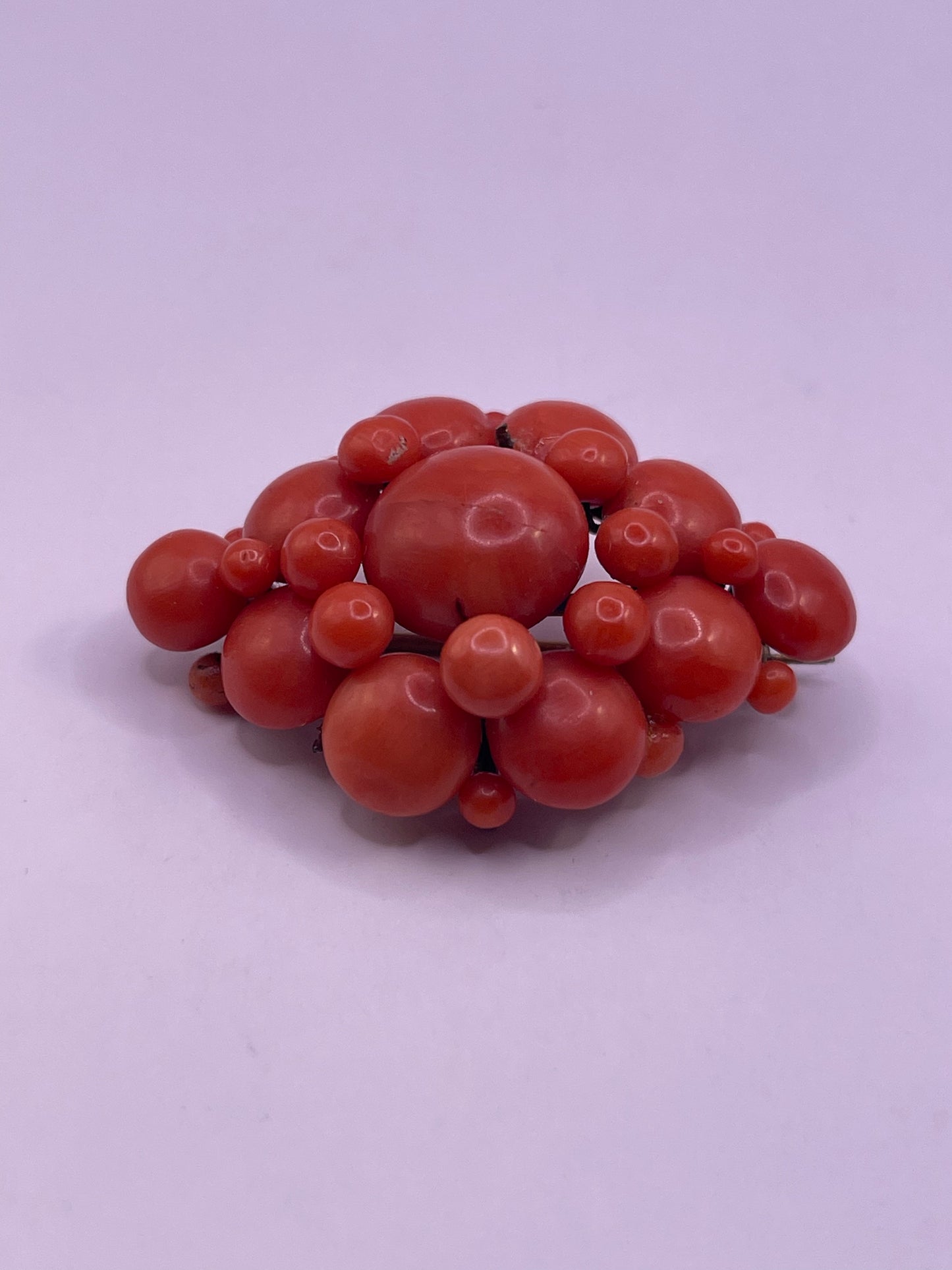 A natural untreated coral orange/ pink pin/ pendant